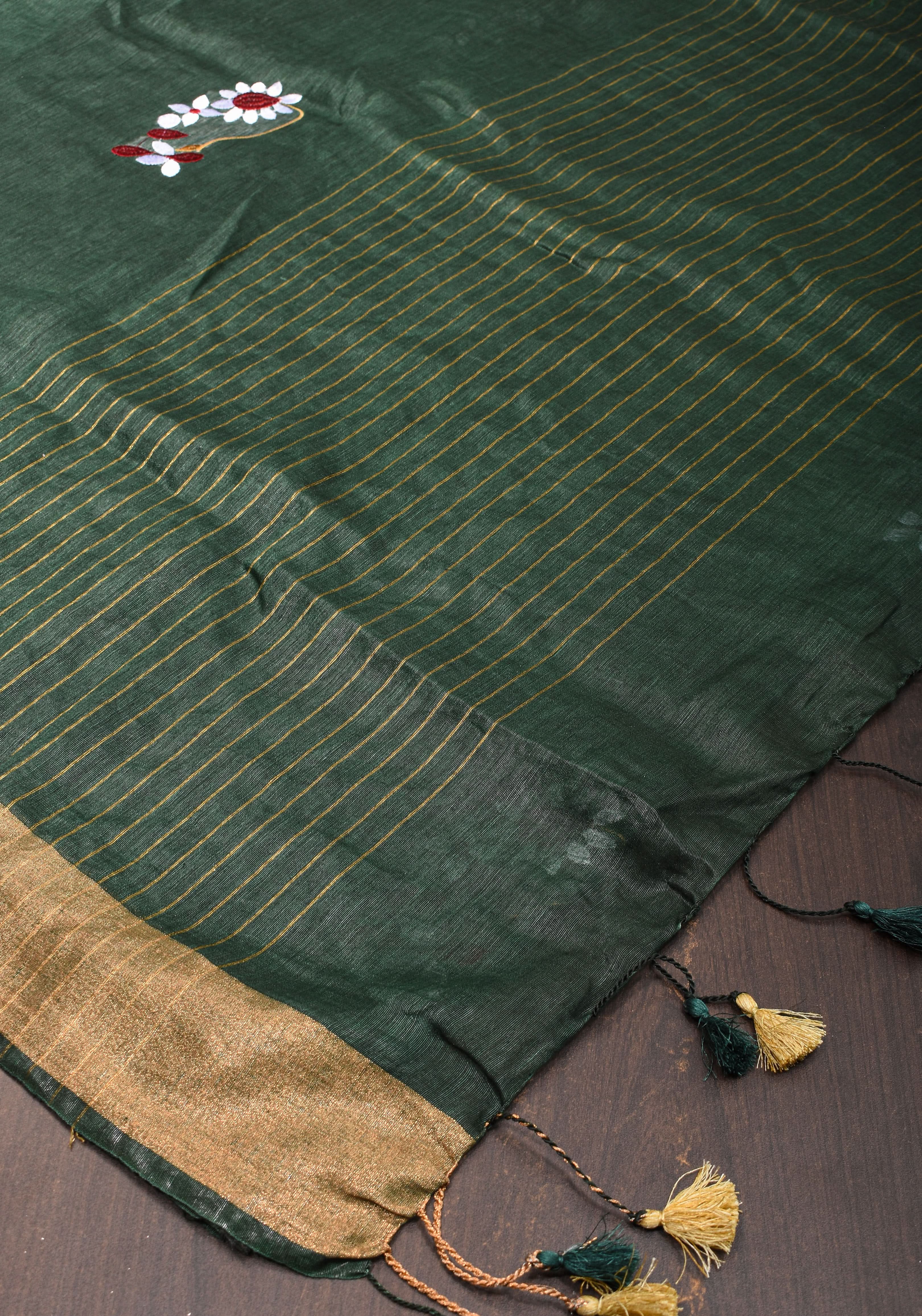 Hunter Green Silk Linen Saree with Moti Nath Embroidery,Woven zari Borders and Long Tassels | Shobitam
