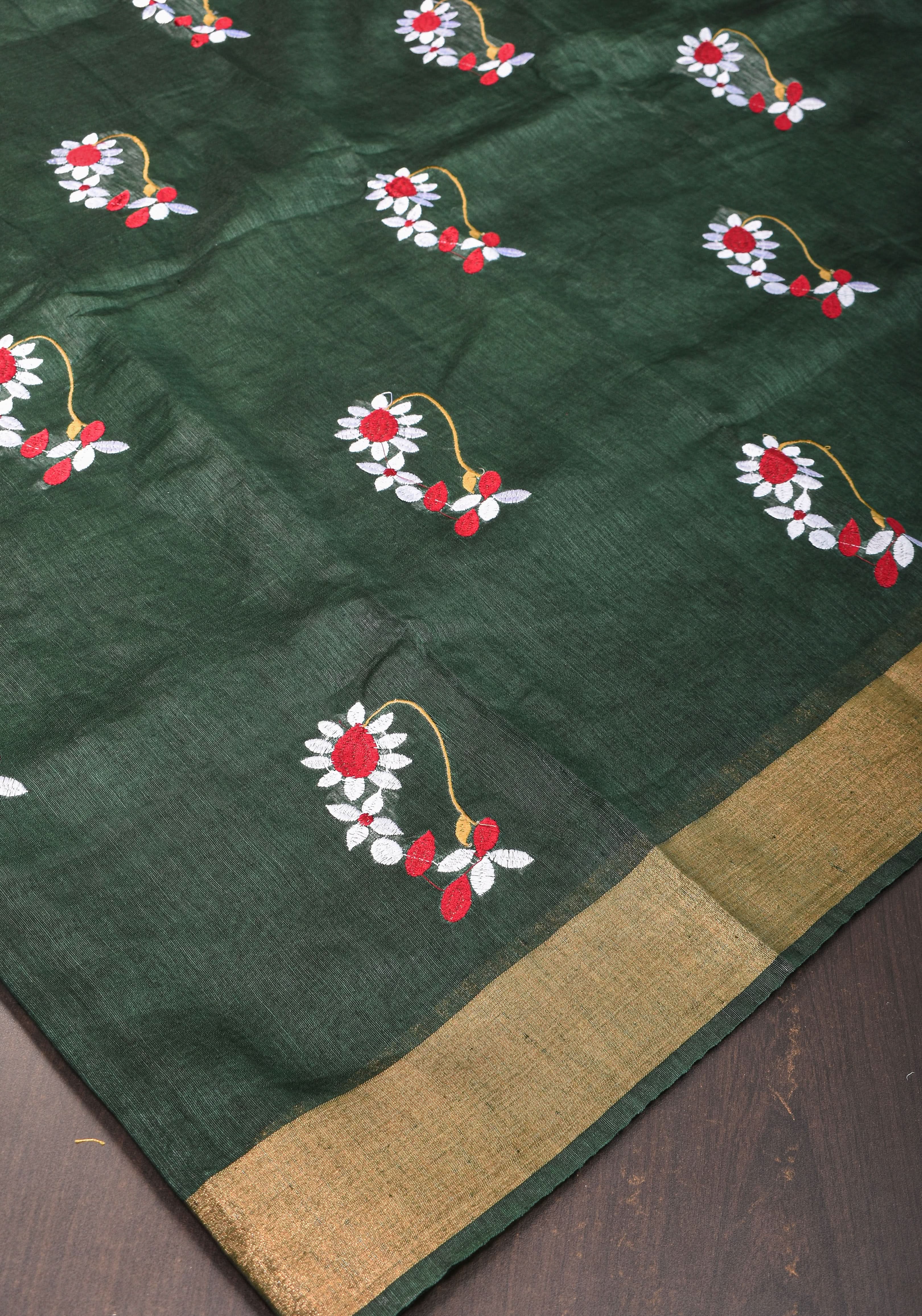 Hunter Green Silk Linen Saree with Moti Nath Embroidery,Woven zari Borders and Long Tassels | Shobitam