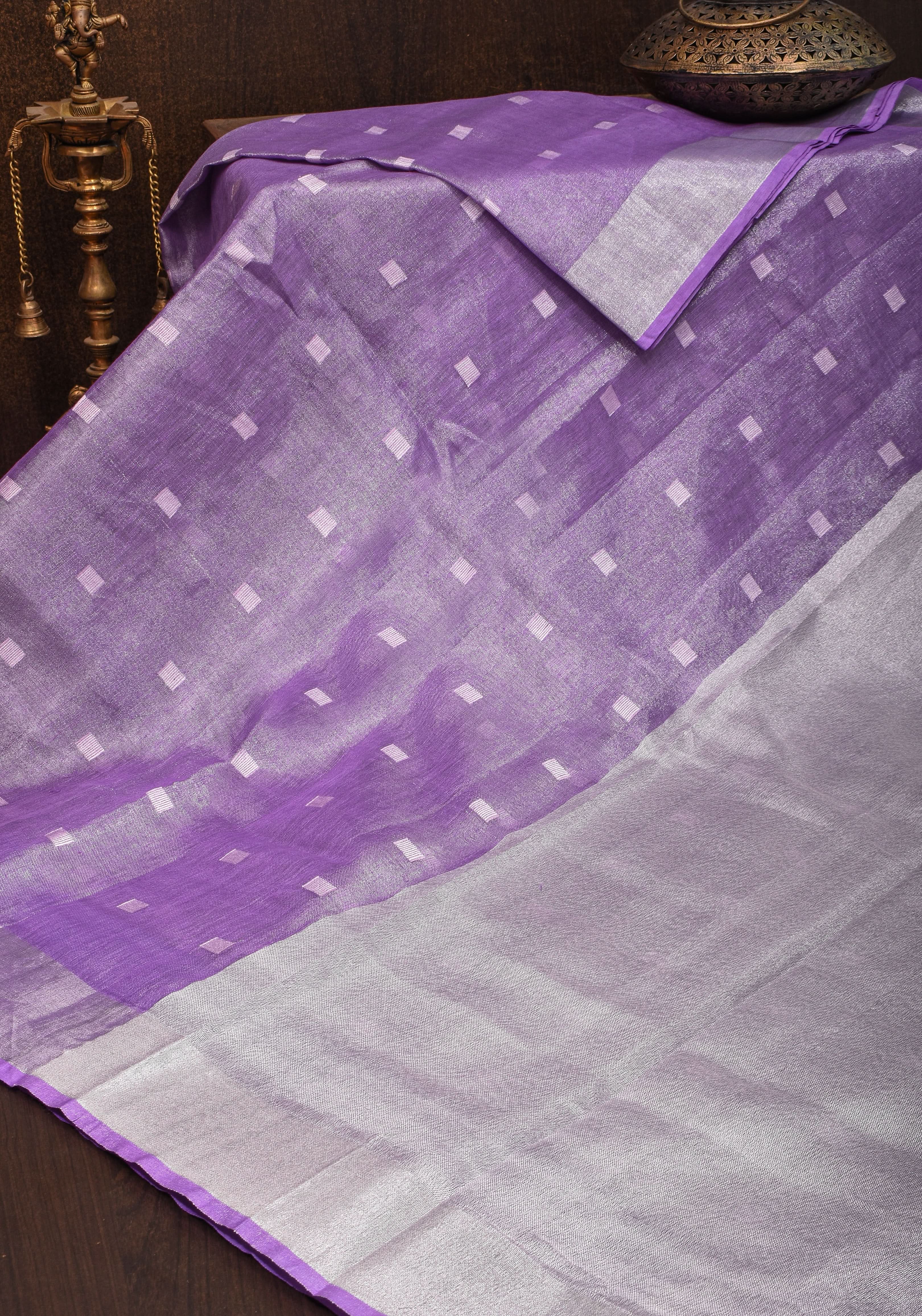 Lavender Hued Tissue Linen Saree with silver zari borders and long tassels! | Shobitam