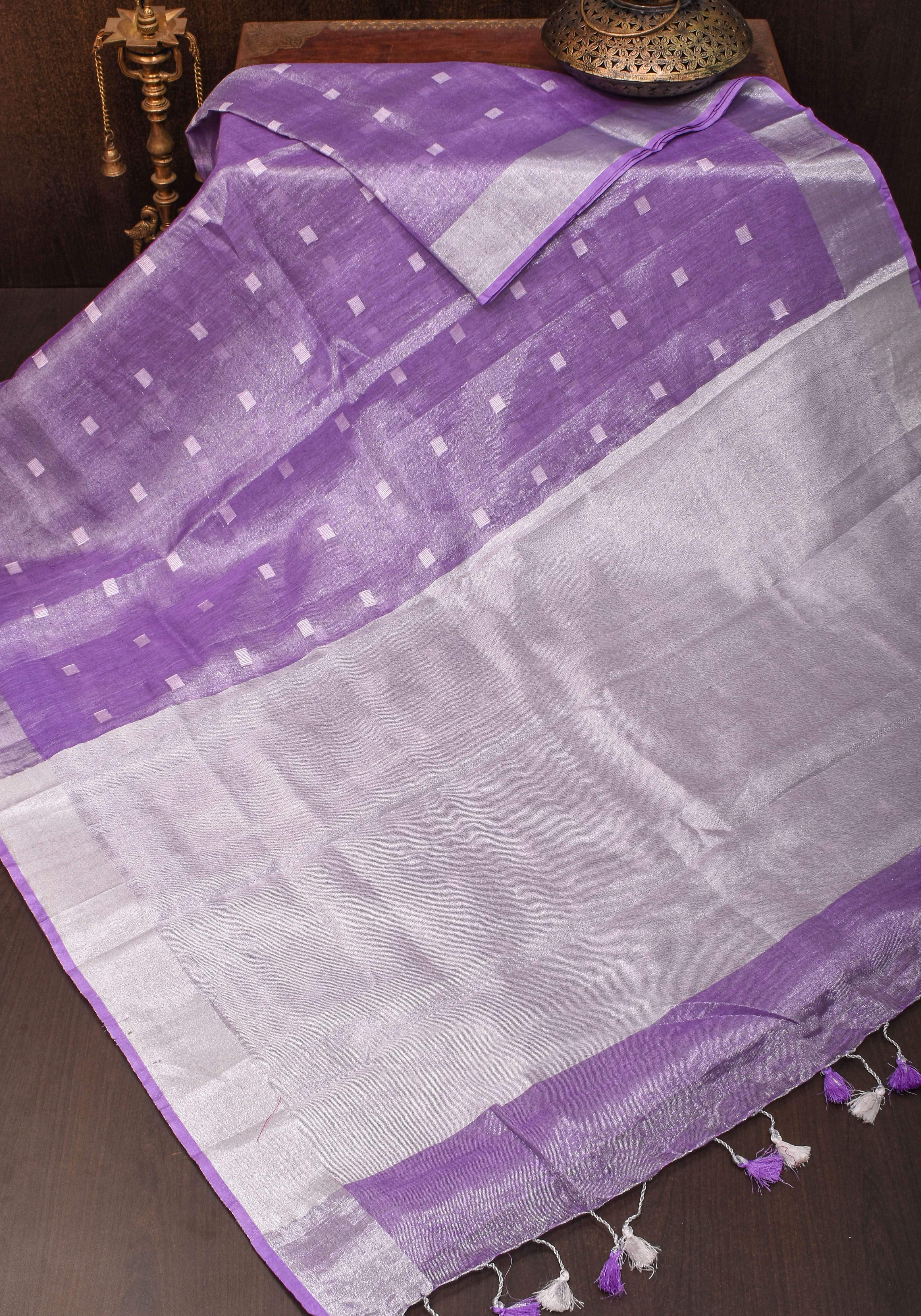 Lavender Hued Tissue Linen Saree with silver zari borders and long tassels! | Shobitam