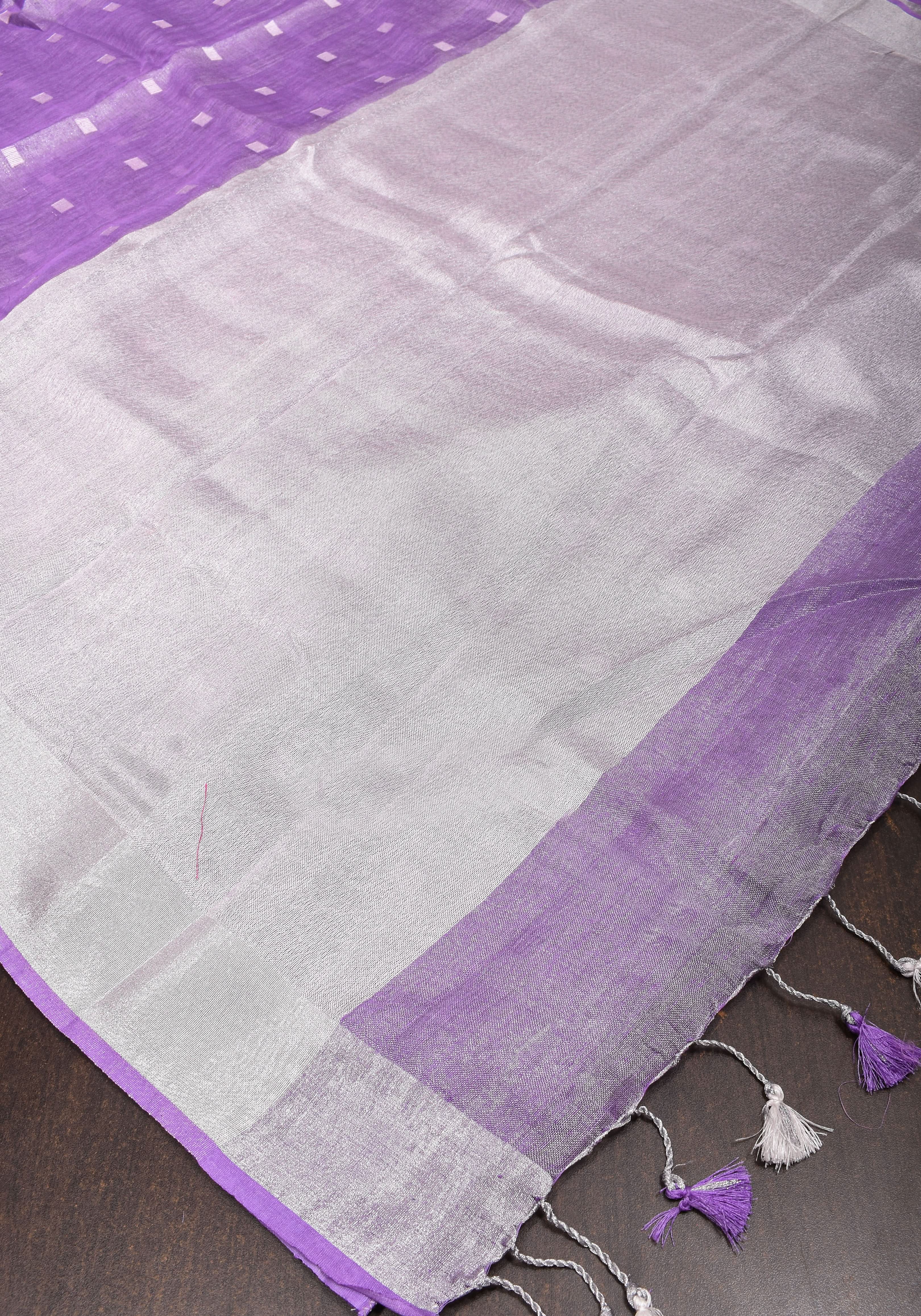 Lavender Hued Tissue Linen Saree with silver zari borders and long tassels! | Shobitam