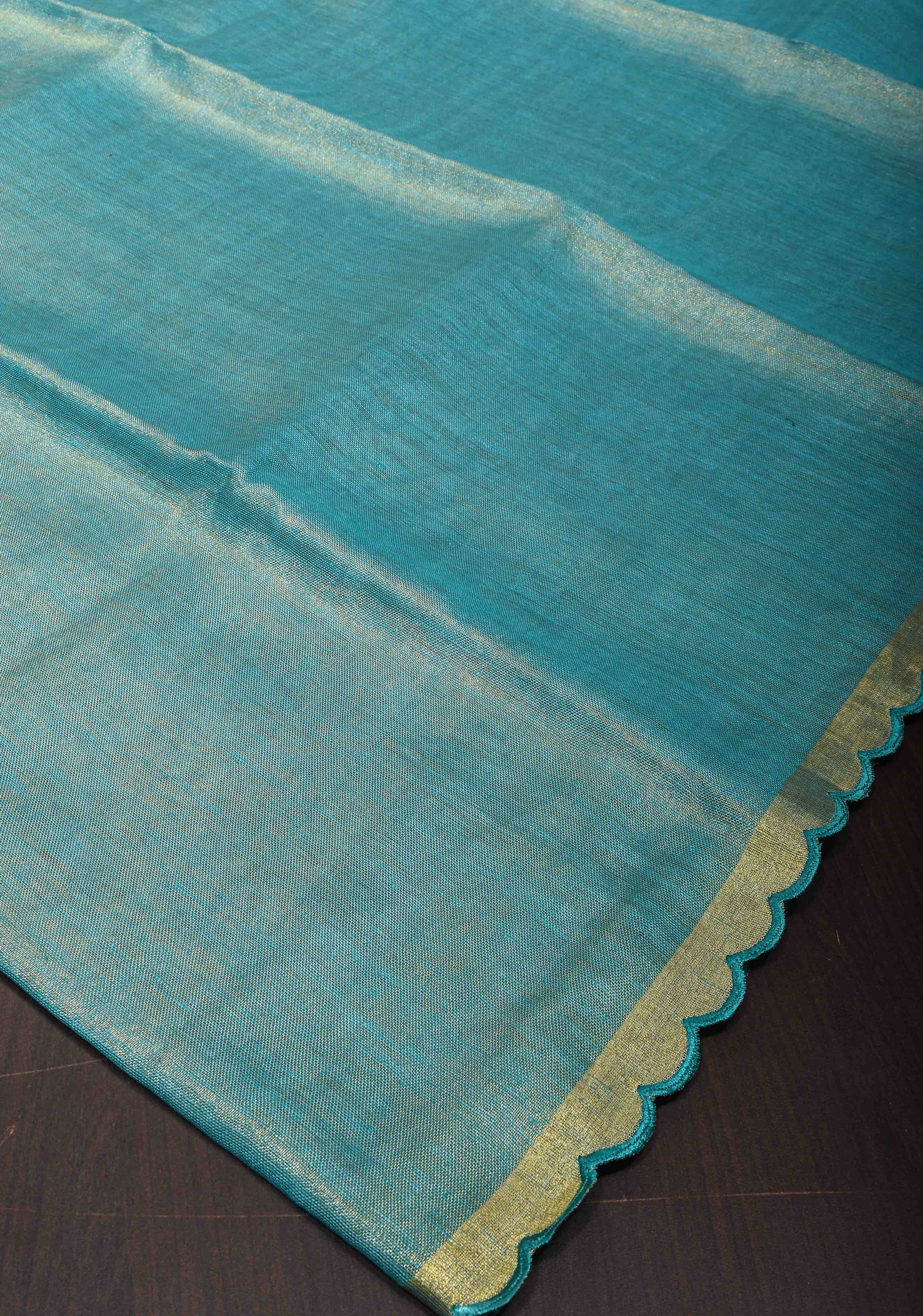 Sea Green Scalloped Tissue Linen Saree and Golden border | Shobitam