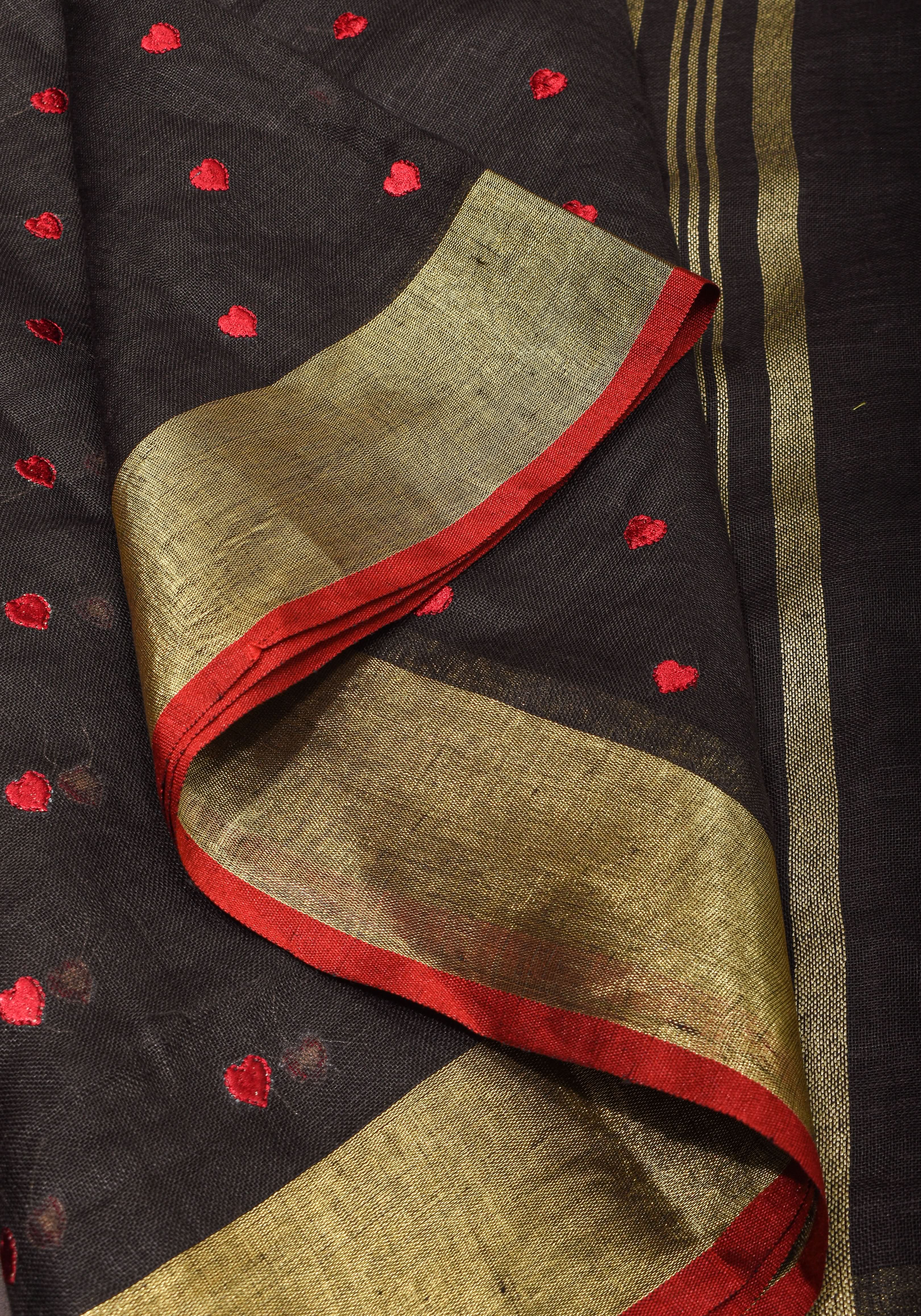 Shobitam Exclusive Celebrity Loving Hearts Embroidered Black Pure Linen Saree