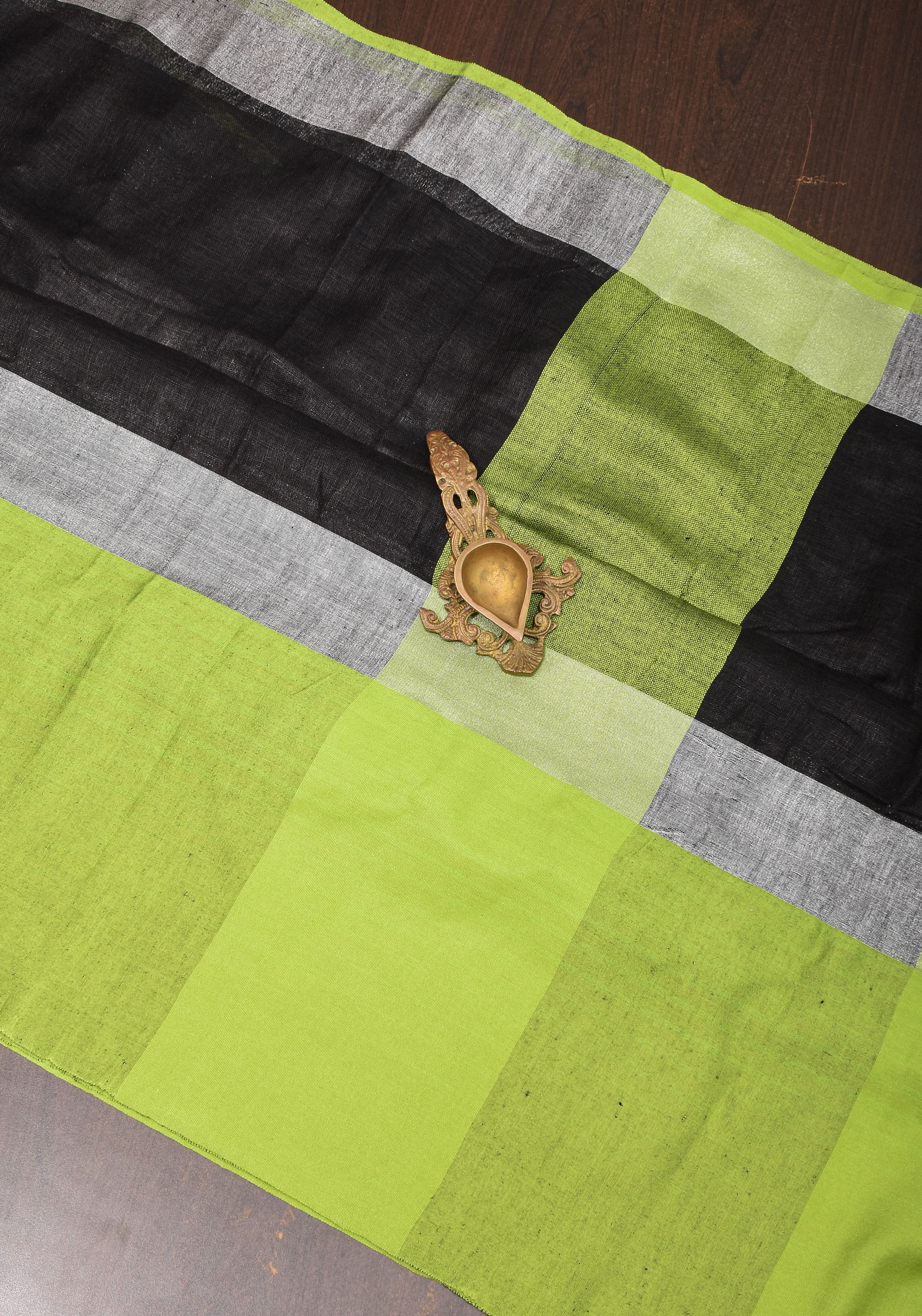 Black and Leaf Green Wide Border Linen by Linen Saree | Shobitam
