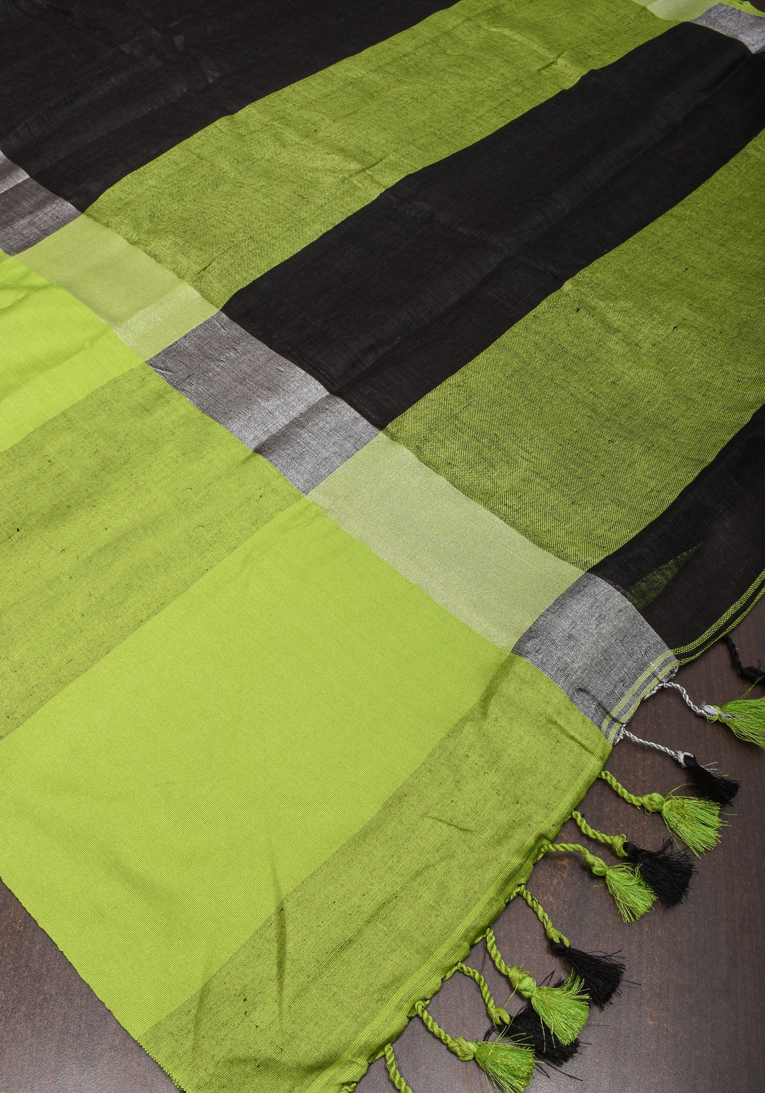 Black and Leaf Green Wide Border Linen by Linen Saree | Shobitam