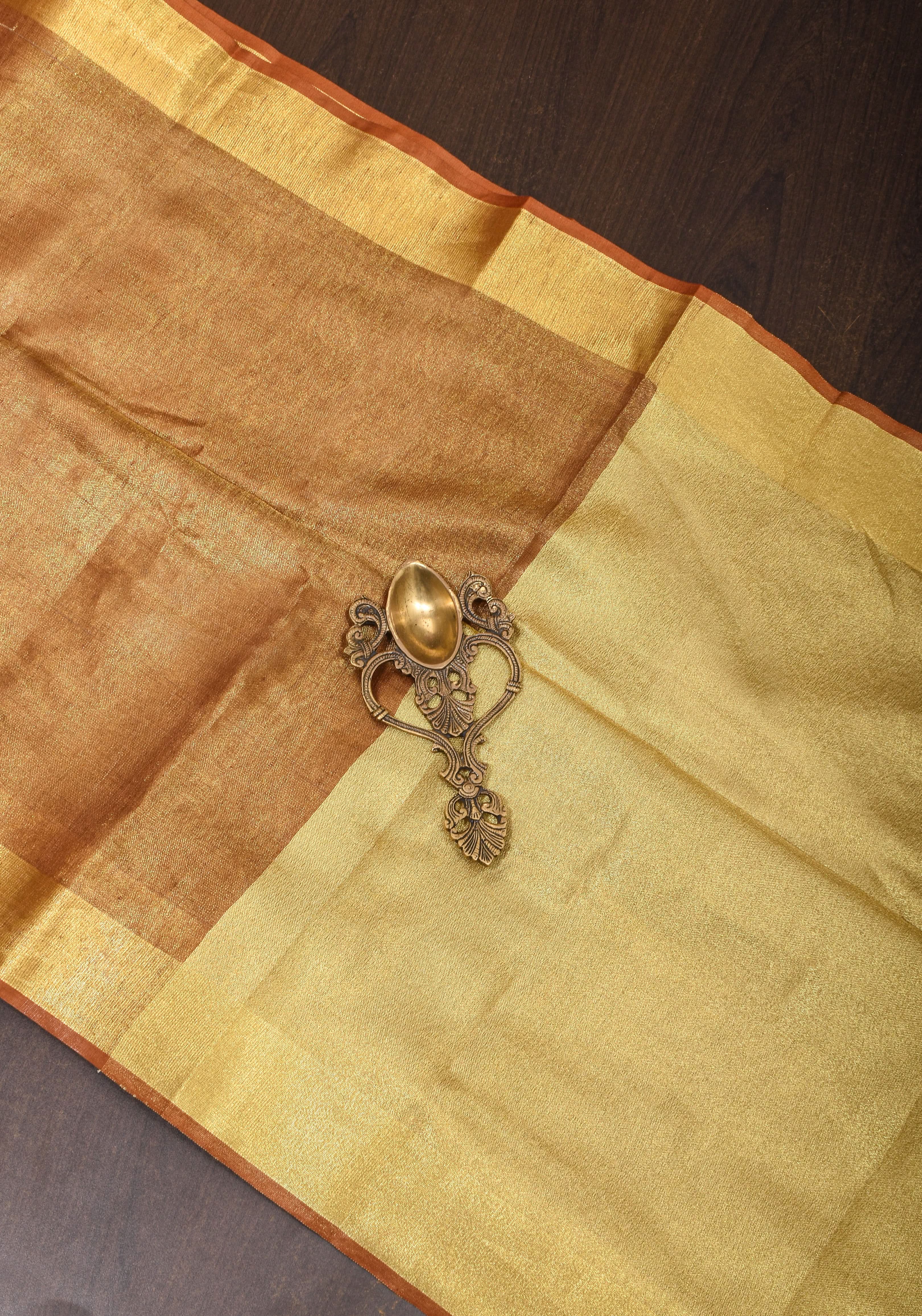 Caramel and Gold Tissue Linen Saree with Zari Border and long tassels | Shobitam