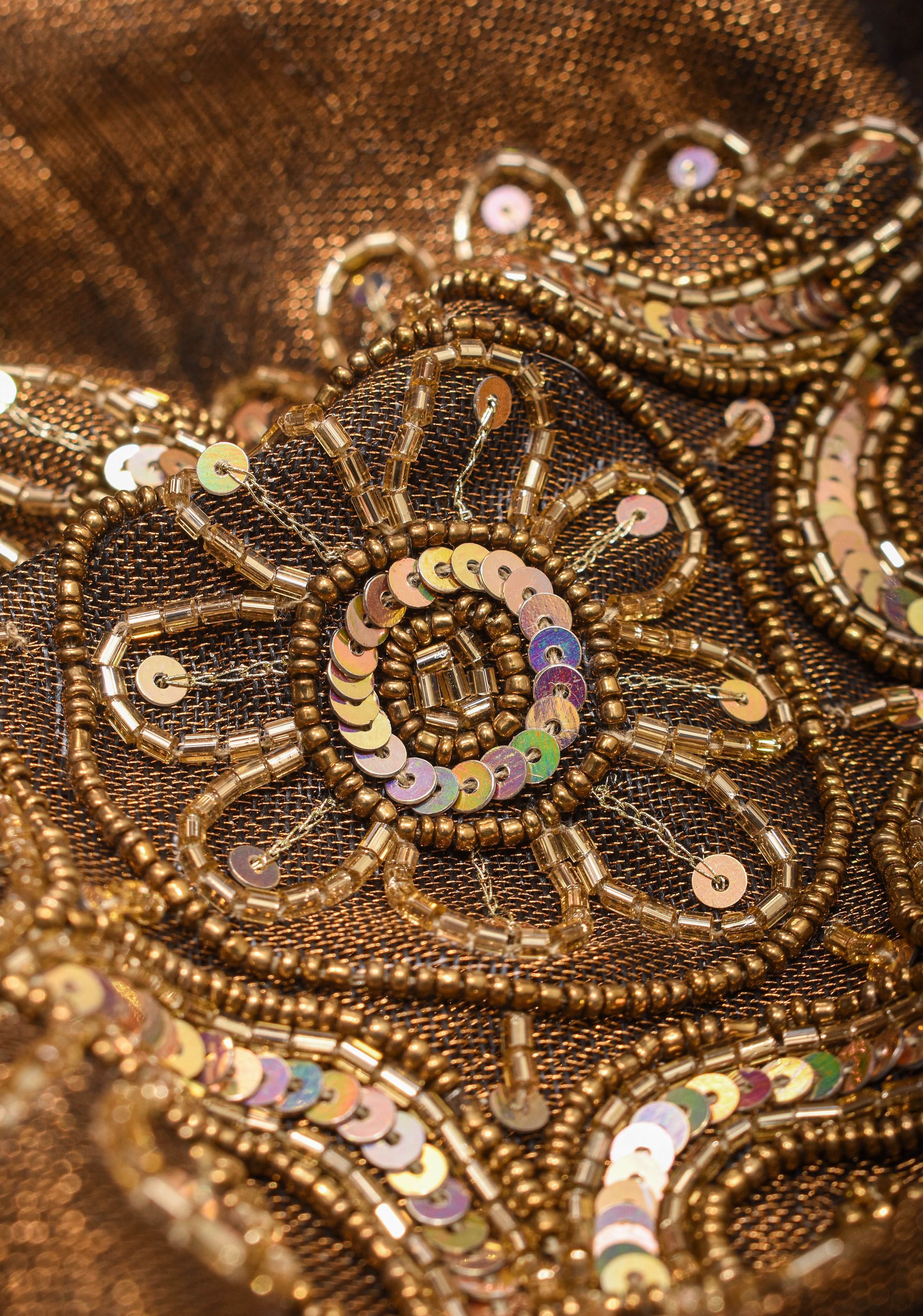 Embroidery cut dana with seqins Work Tissue Linen Saree in copper black with dramatic work Pallu | Shobitam
