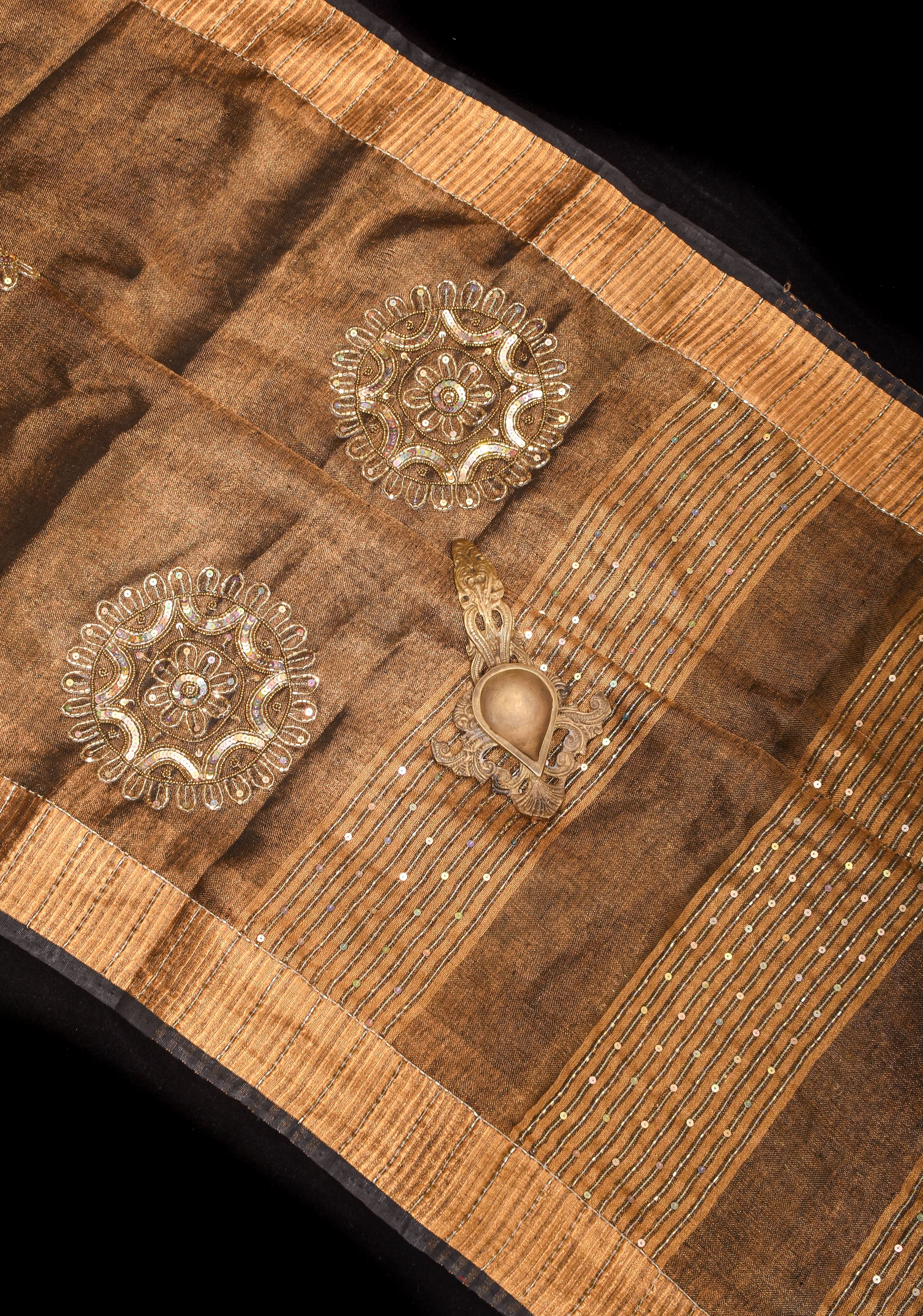 Embroidery cut dana with seqins Work Tissue Linen Saree in copper black with dramatic work Pallu | Shobitam