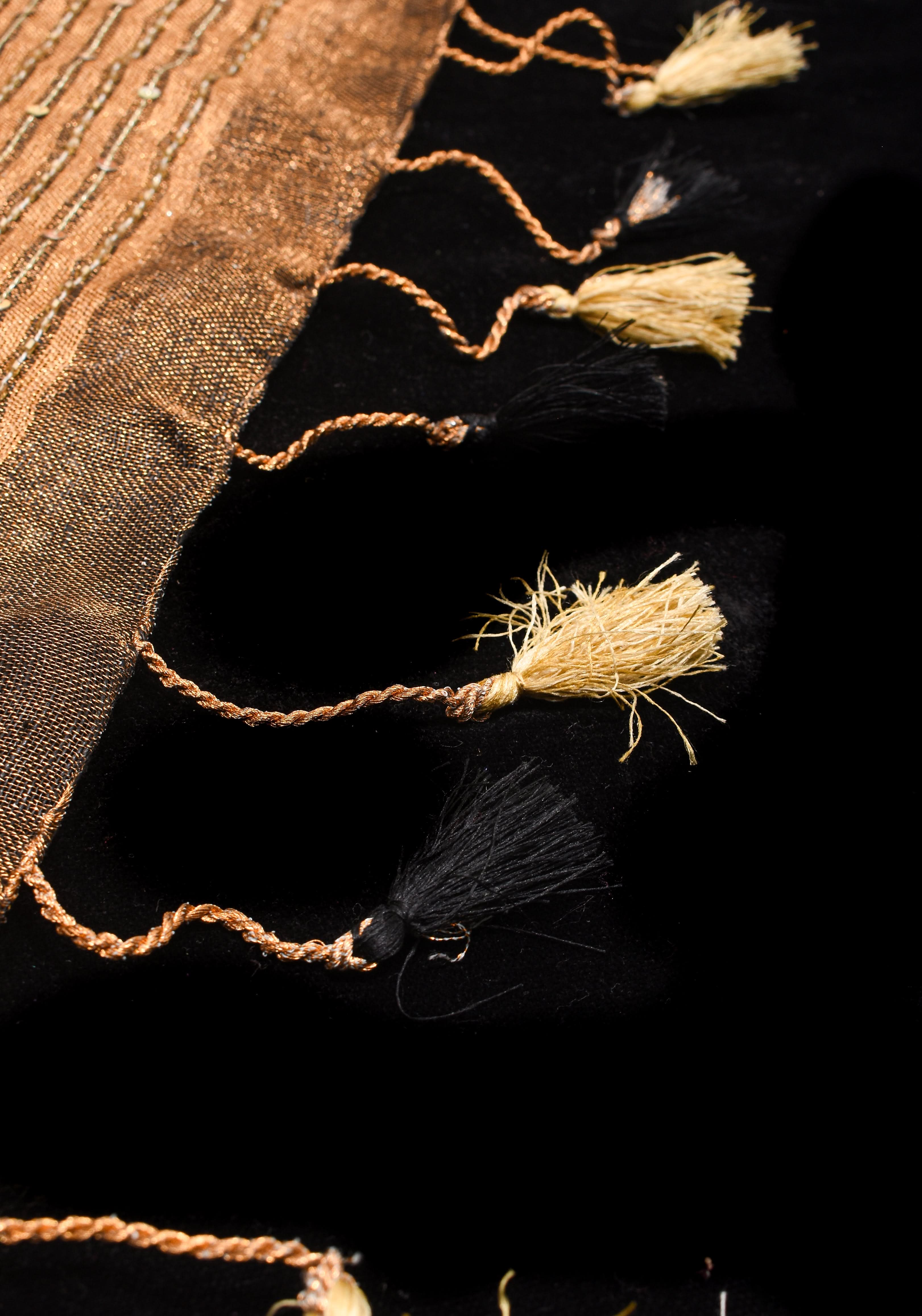 Embroidery cut dana with seqins Work Tissue Linen Saree in copper black with dramatic work Pallu | Shobitam
