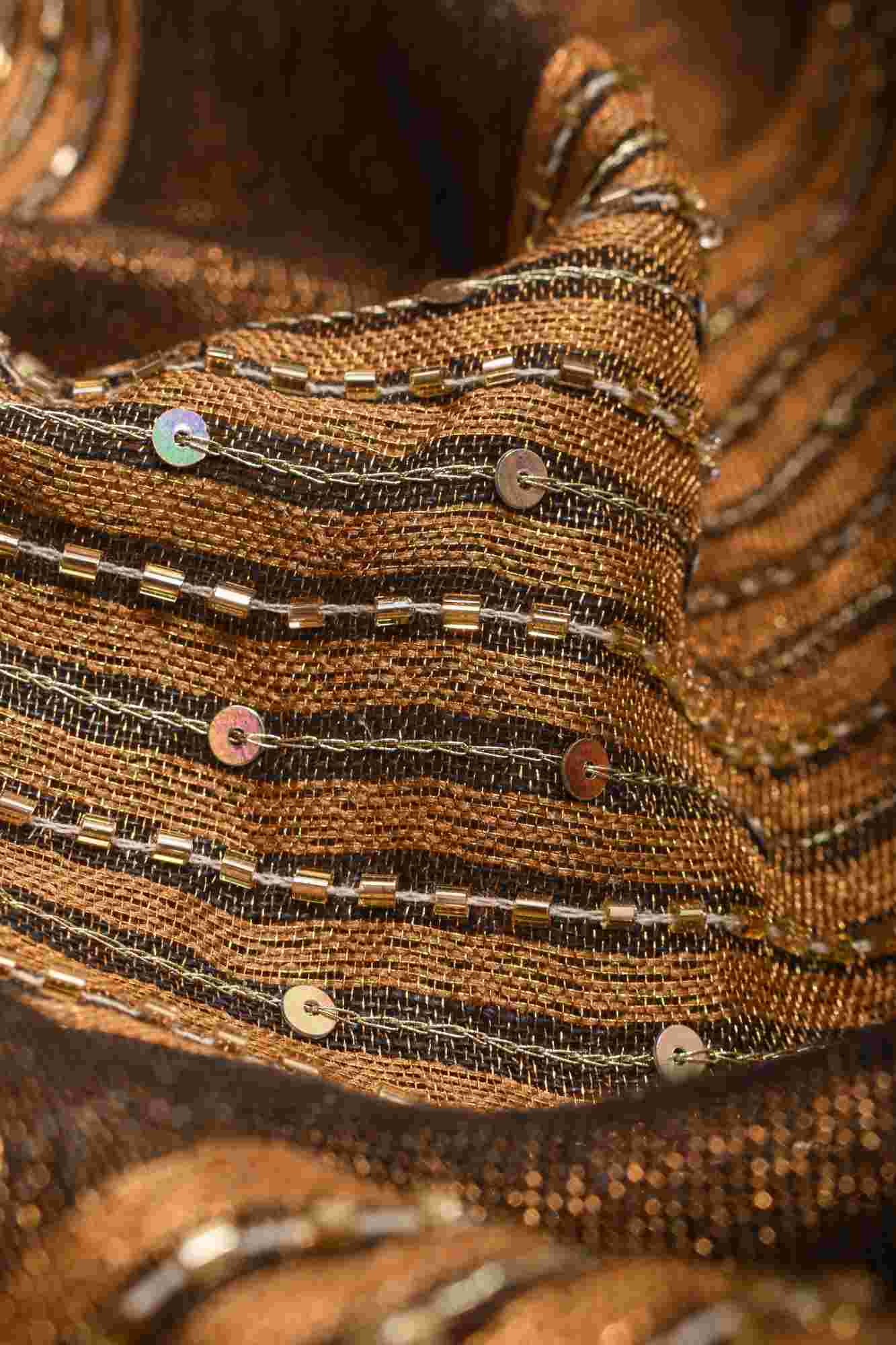 Embroidery cut dana with seqins Work Tissue Linen Saree in copper black with dramatic work Pallu