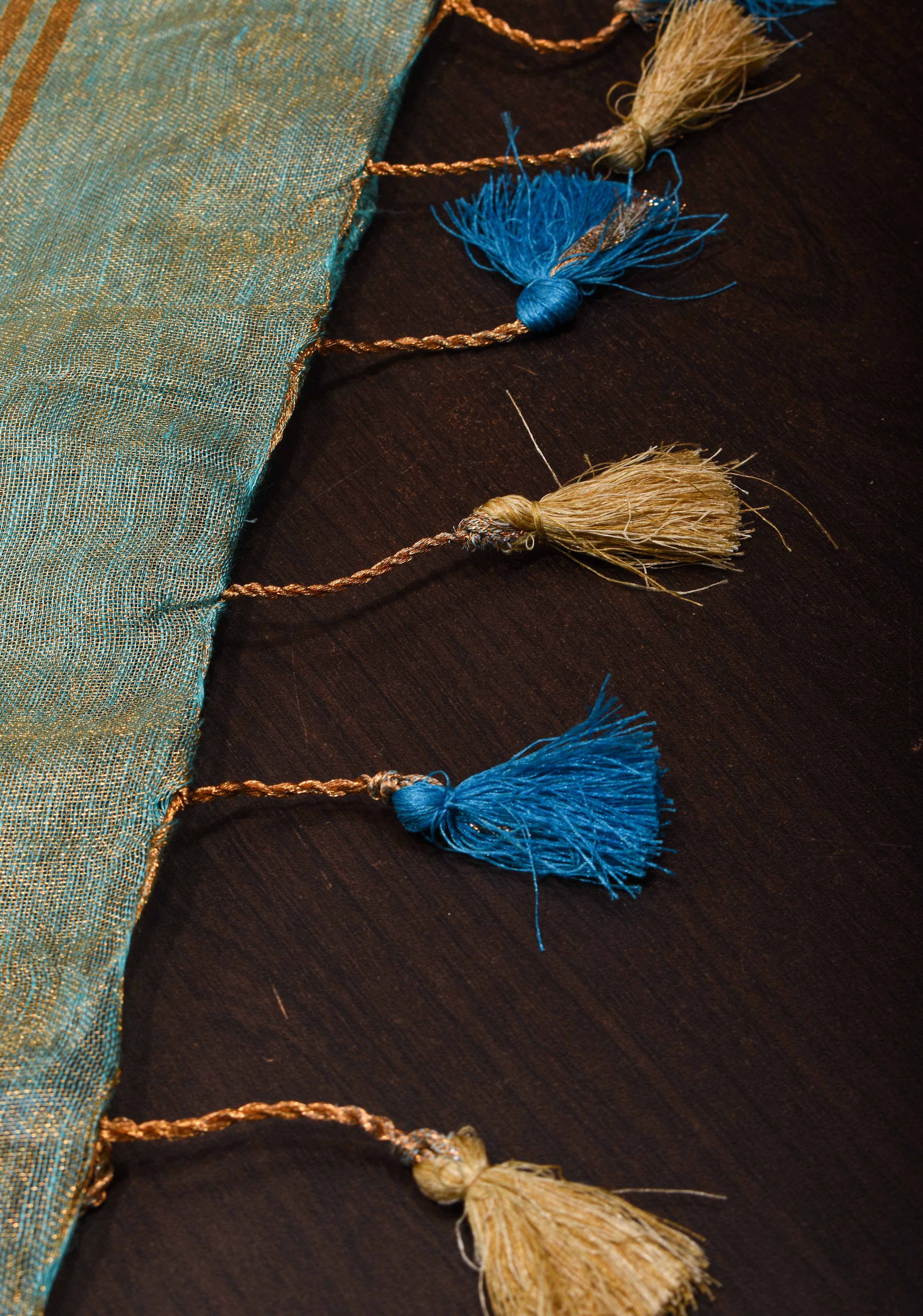 Hand Beadwork on Tissue Linen Saree in Blue with Gold Tissue | Shobitam