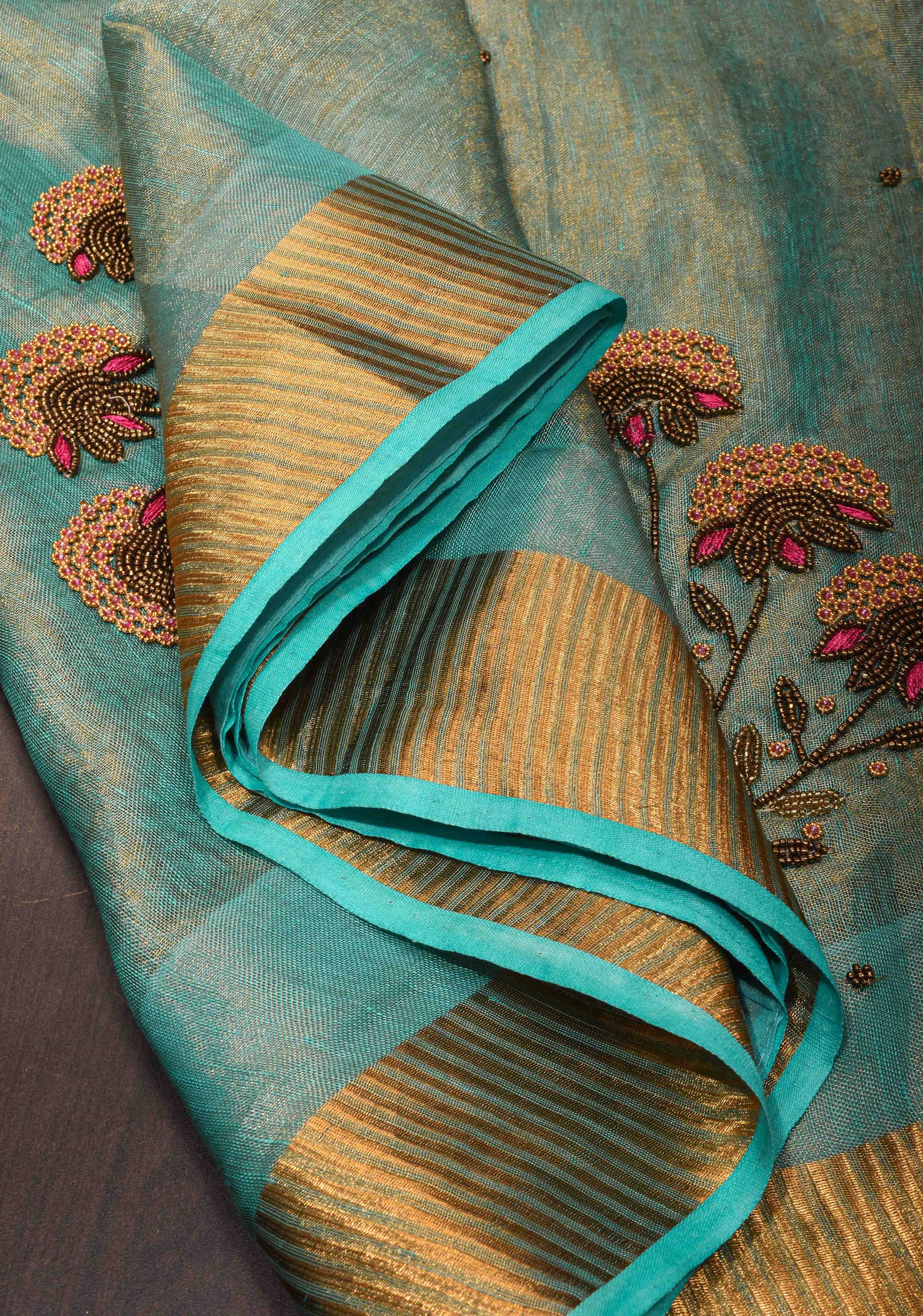 Hand Beadwork on Tissue Linen Saree in Blue with Gold Tissue | Shobitam