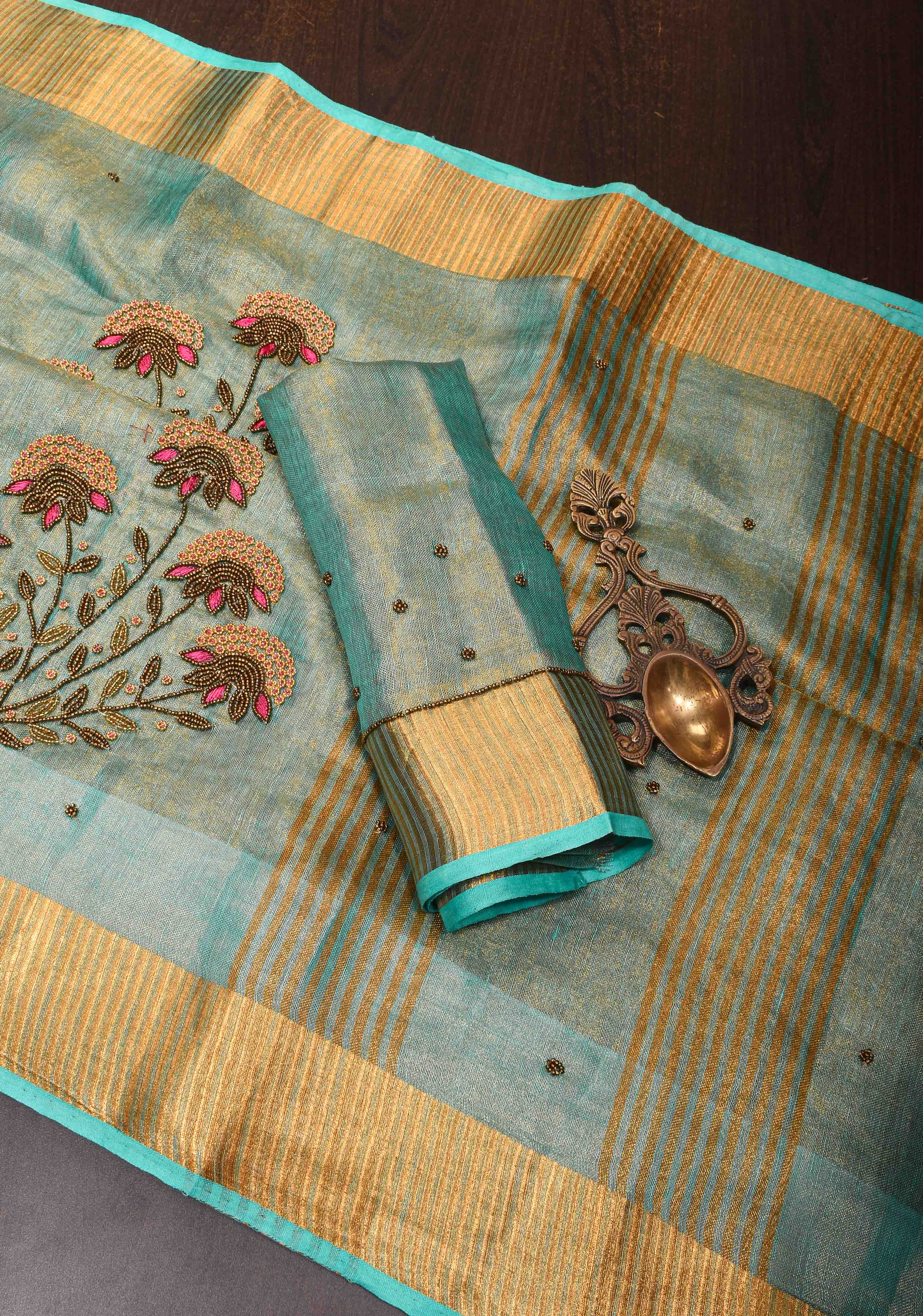 Hand Beadwork on Tissue Linen Saree in Blue with Gold Tissue | Shobitam