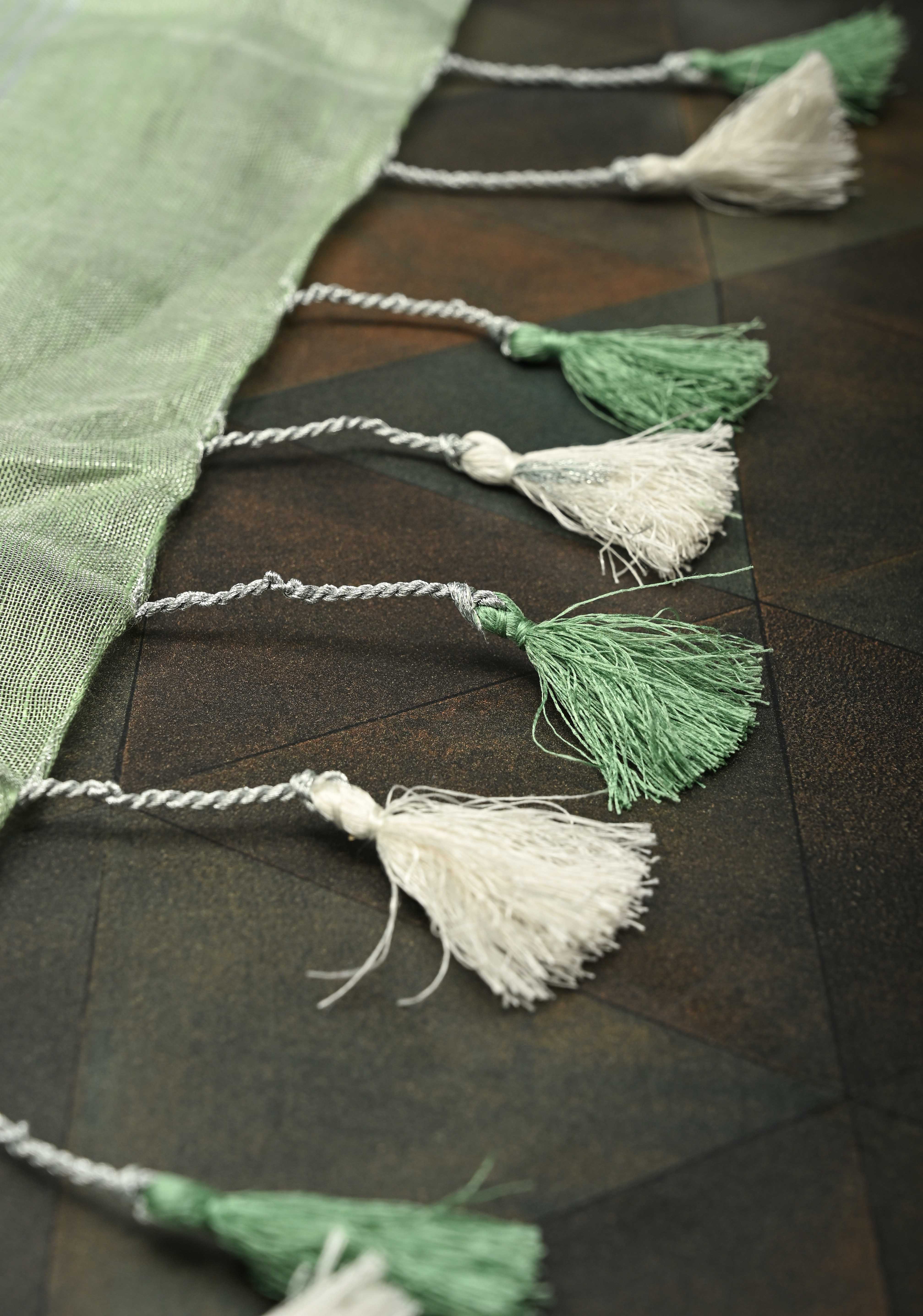 Hand Beadwork and Embroidery on Tissue Linen Saree in Sage Green and silver | Shobitam