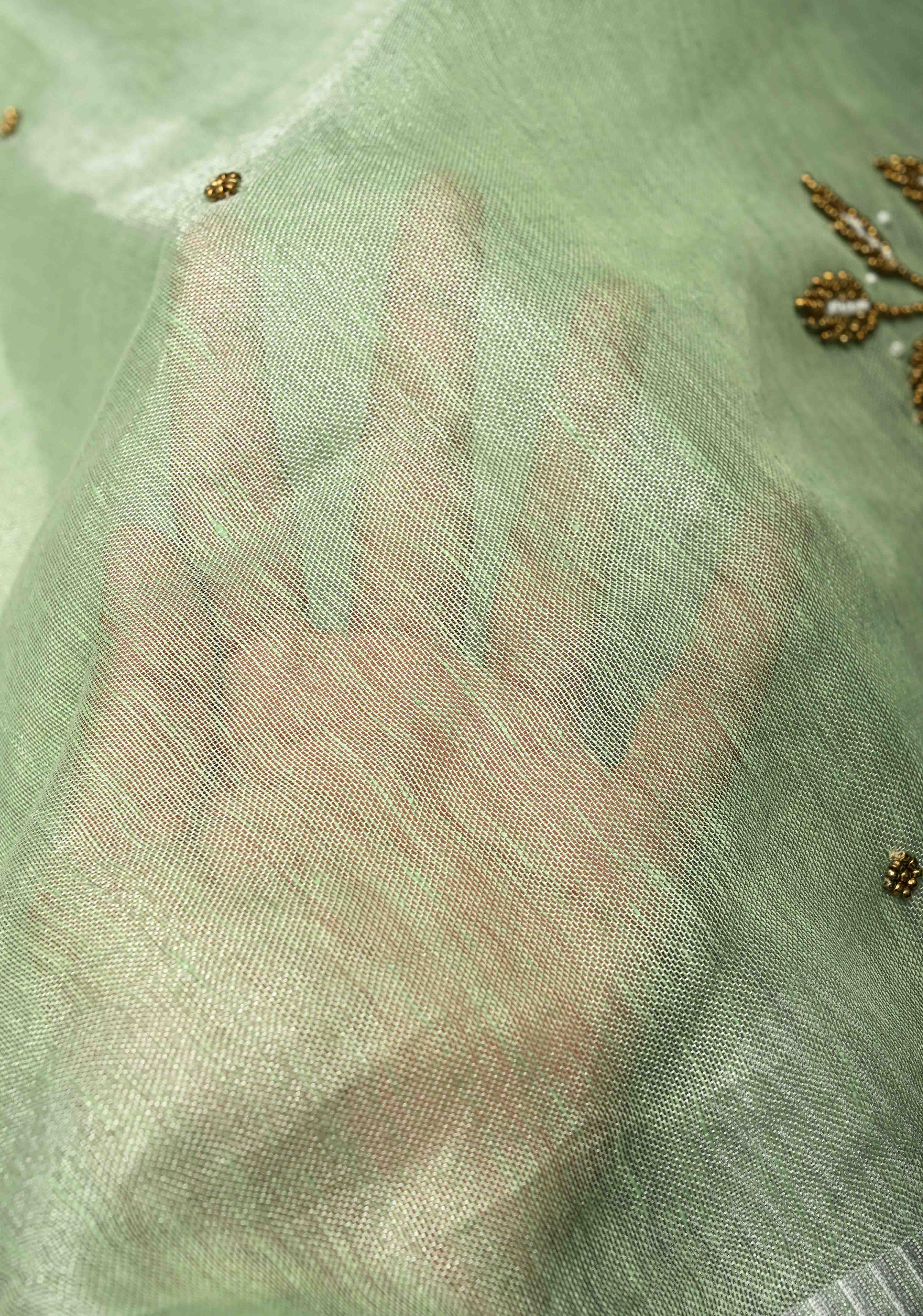 Hand Beadwork and Embroidery on Tissue Linen Saree in Sage Green and silver | Shobitam