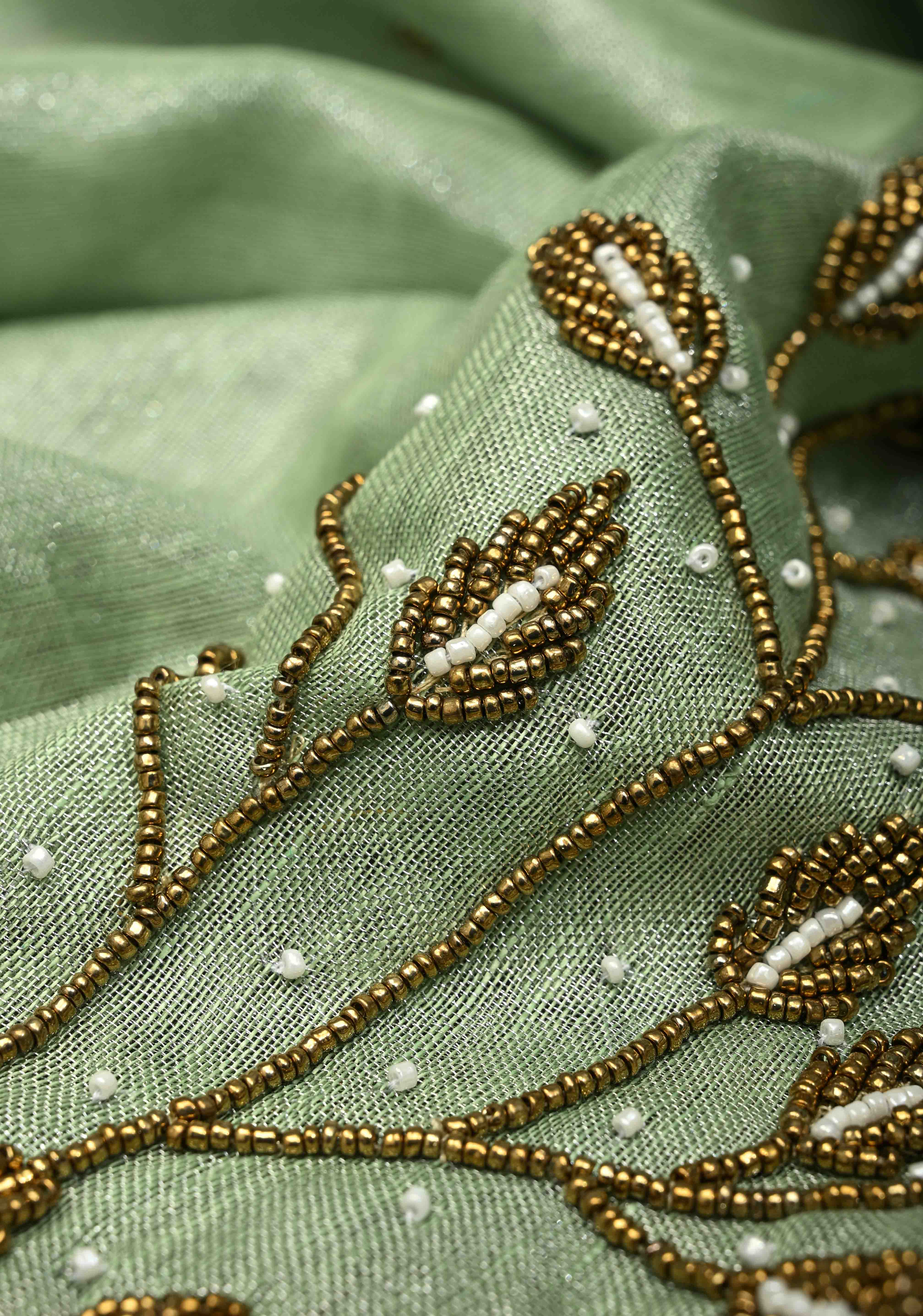 Hand Beadwork and Embroidery on Tissue Linen Saree in Sage Green and silver | Shobitam