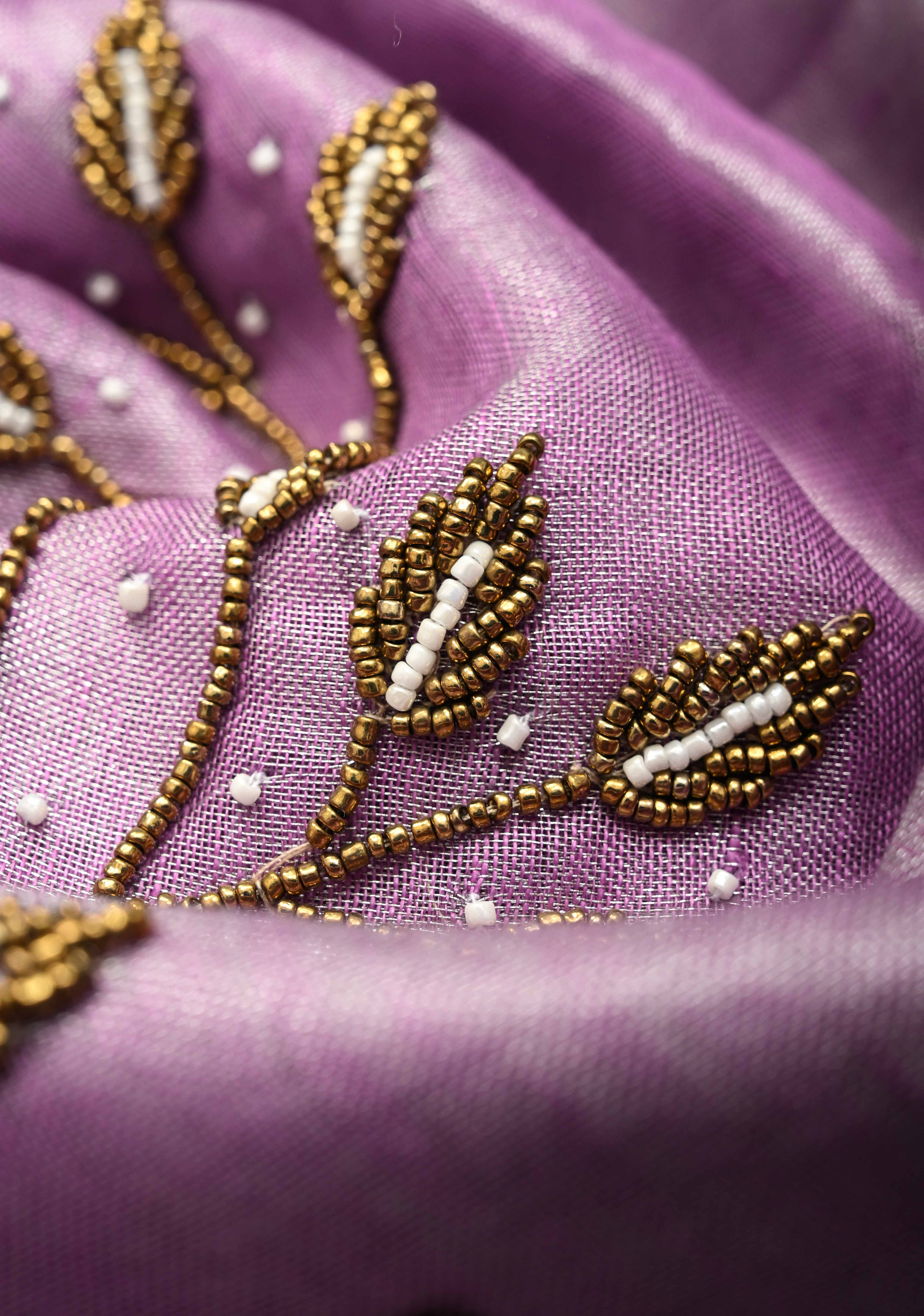 Hand Beadwork on Tissue Linen Saree in Lavender with Silver Tissue | Shobitam