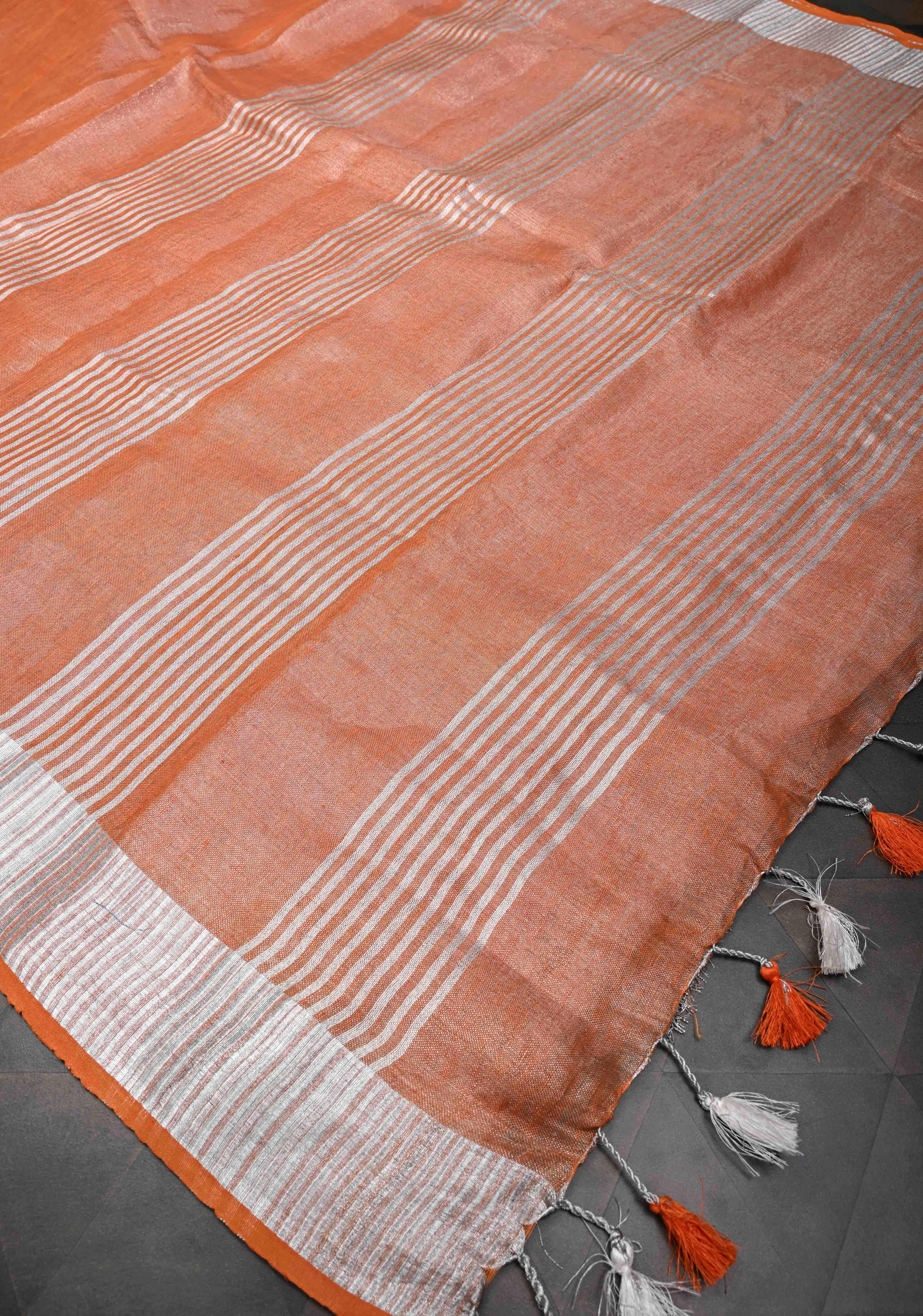 Orange Tissue Linen Saree with Silver Zari Border