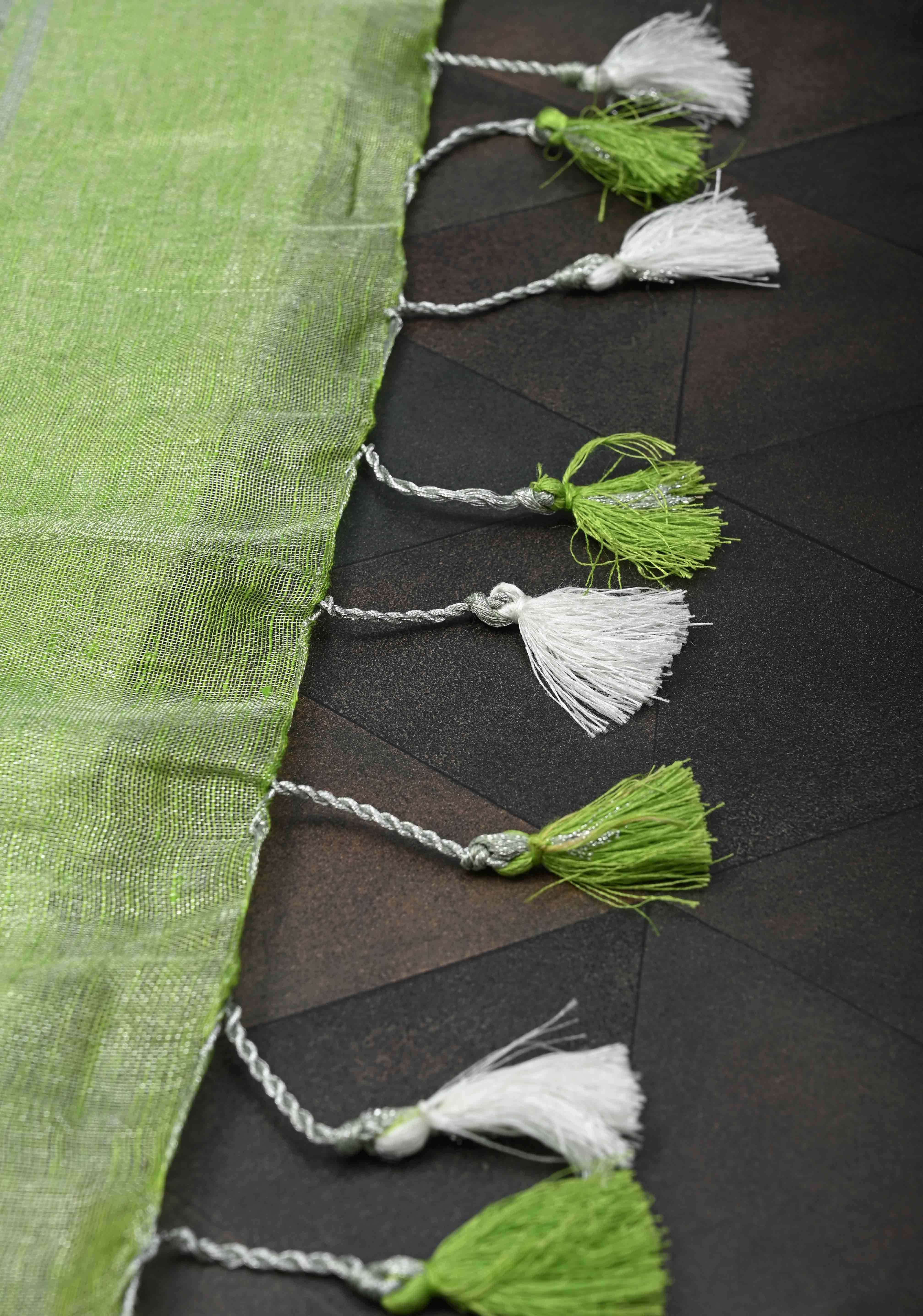 Light Green Tissue Linen Saree With Silver Zari Border | Shobitam