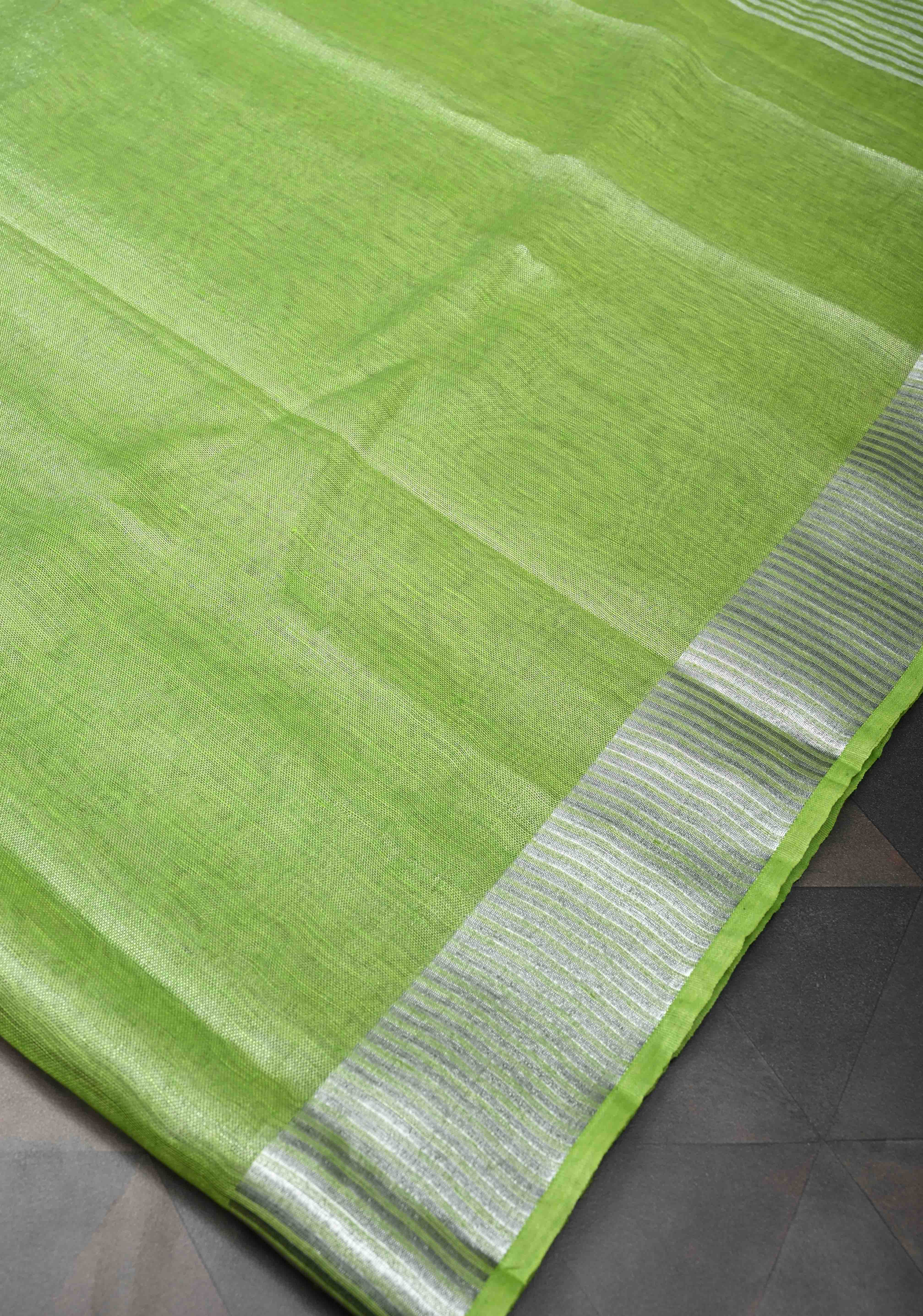 Light Green Tissue Linen Saree With Silver Zari Border | Shobitam