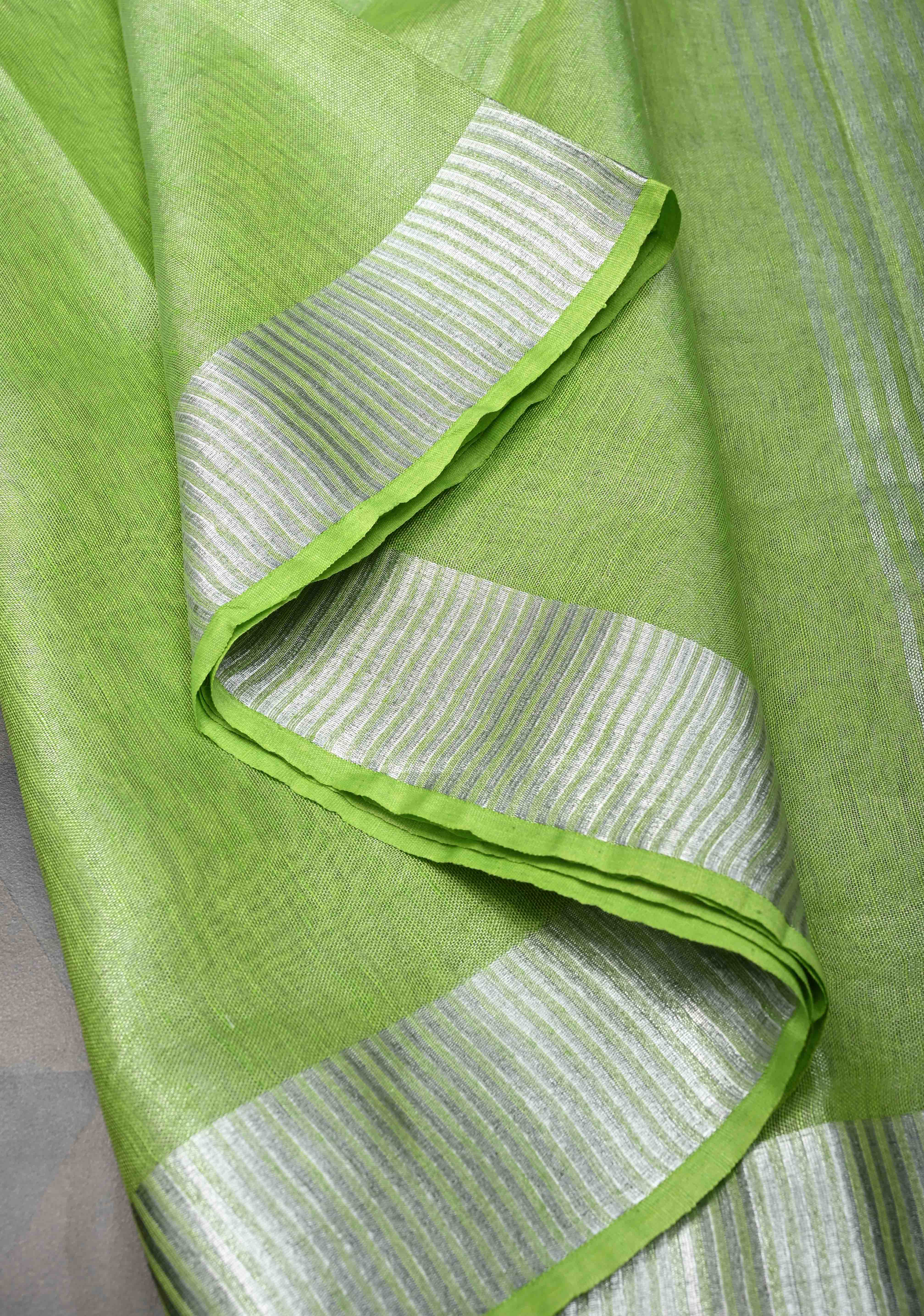 Light Green Tissue Linen Saree With Silver Zari Border | Shobitam