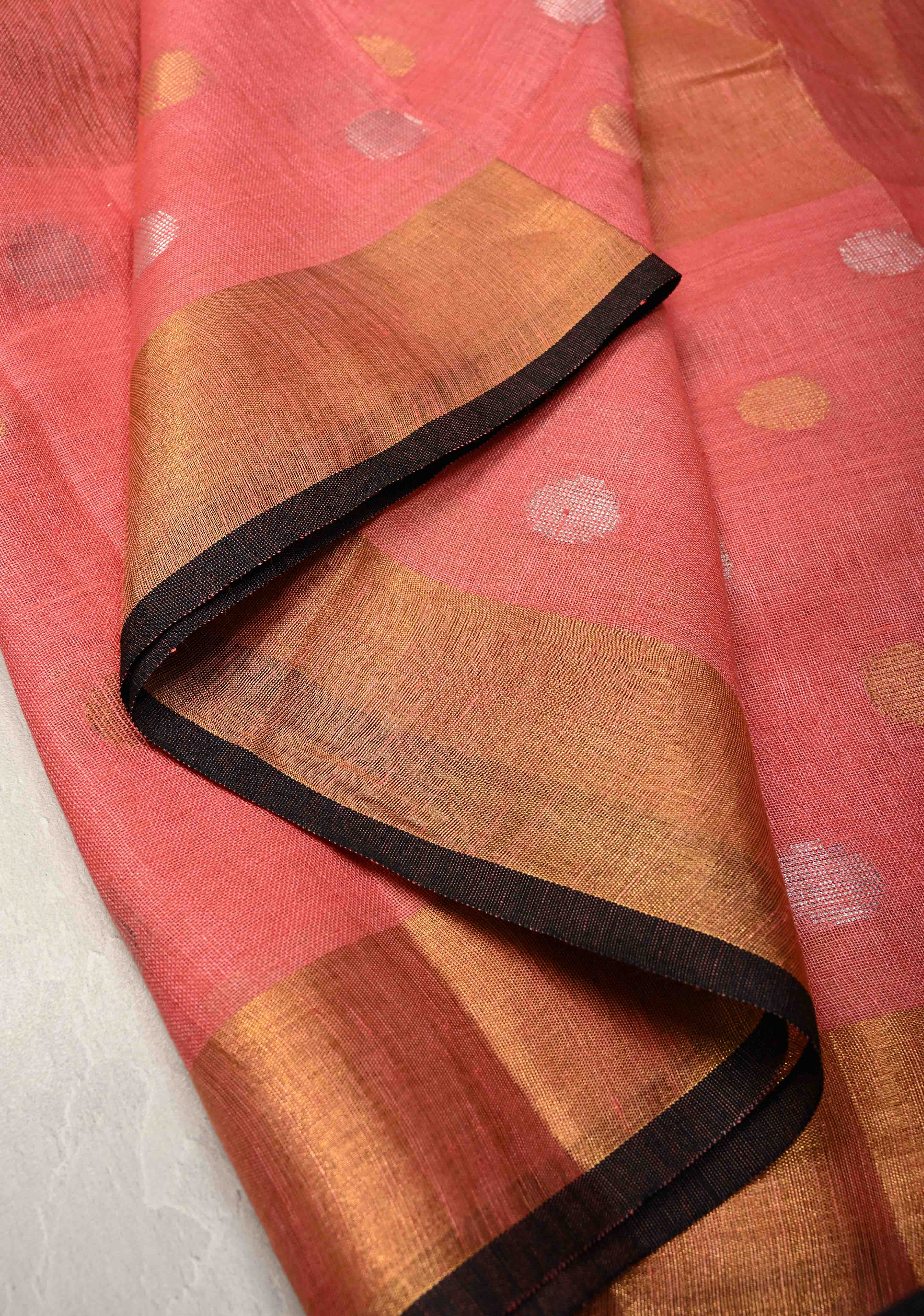 Salmon Pink Tissue Body Linen Saree in Muted Antique Gold with Sona Rupa Polka Dots Skirt Border | Shobitam