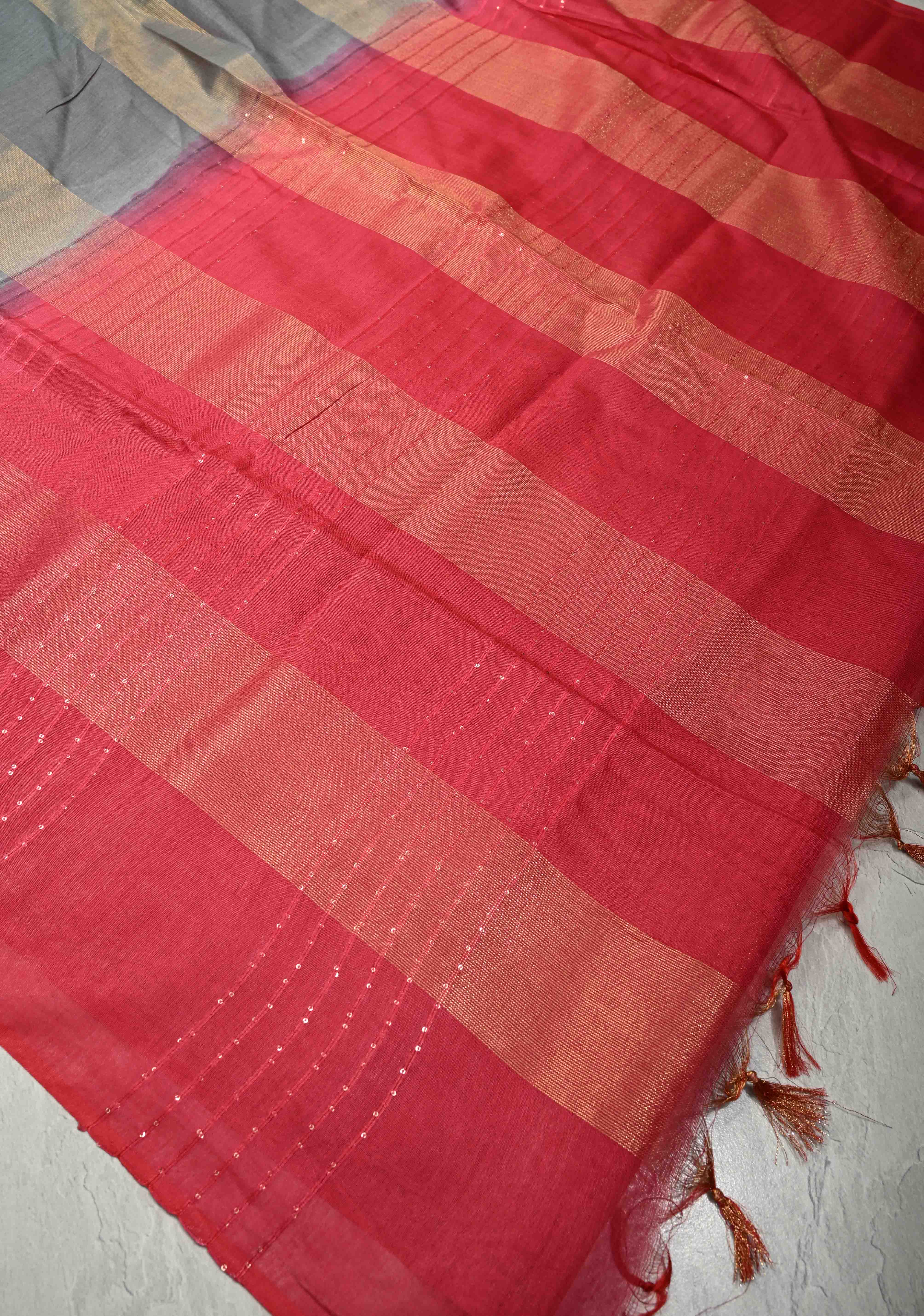 Gray Borderless Semi Tussar Saree with Muted Tissue Panel and Contrast Sequins Pallu