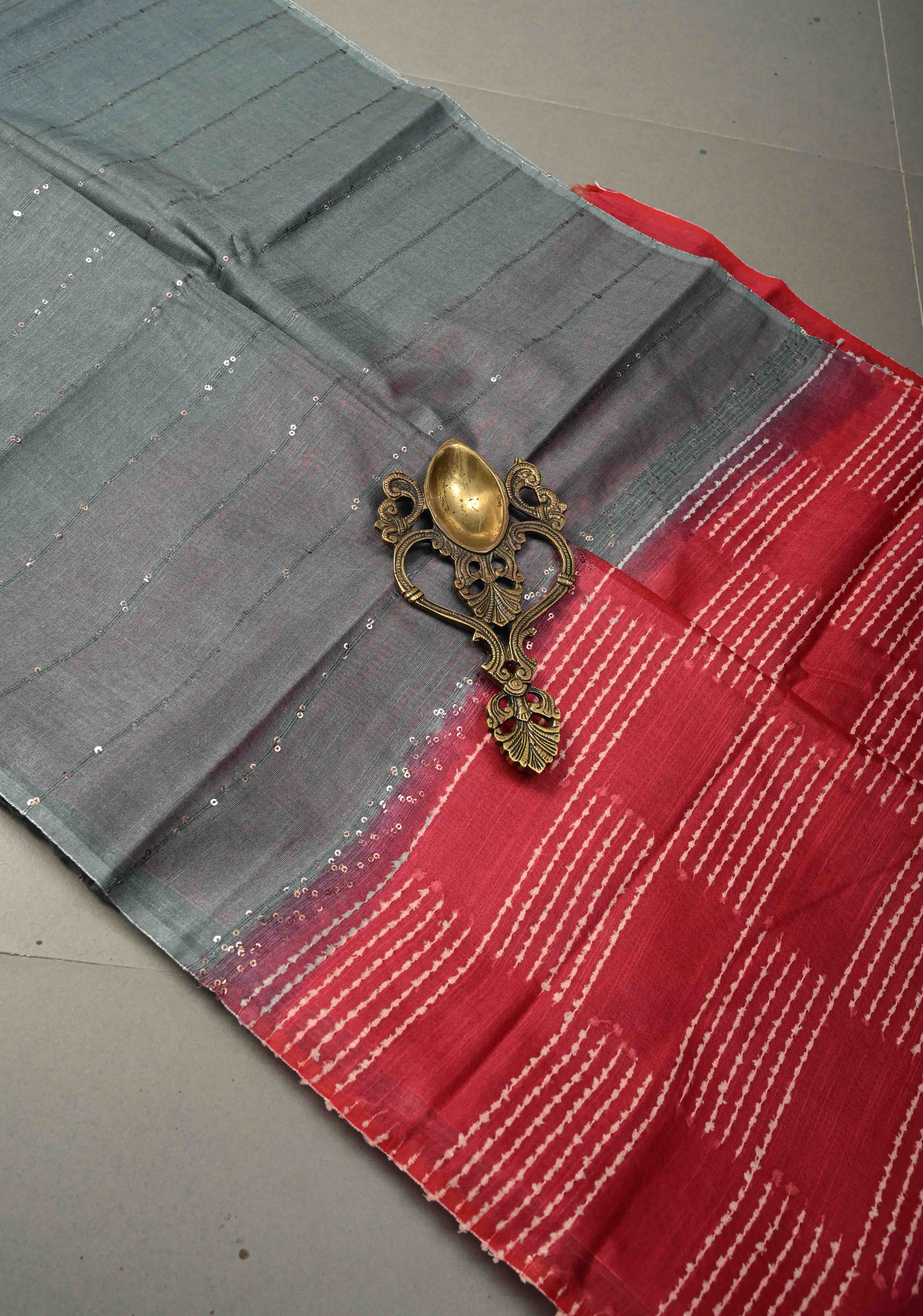 Cloudy Gray Borderless Semi Tussar Saree with Pocket Sequins Detailing and Contrast Pallu | Shobitam