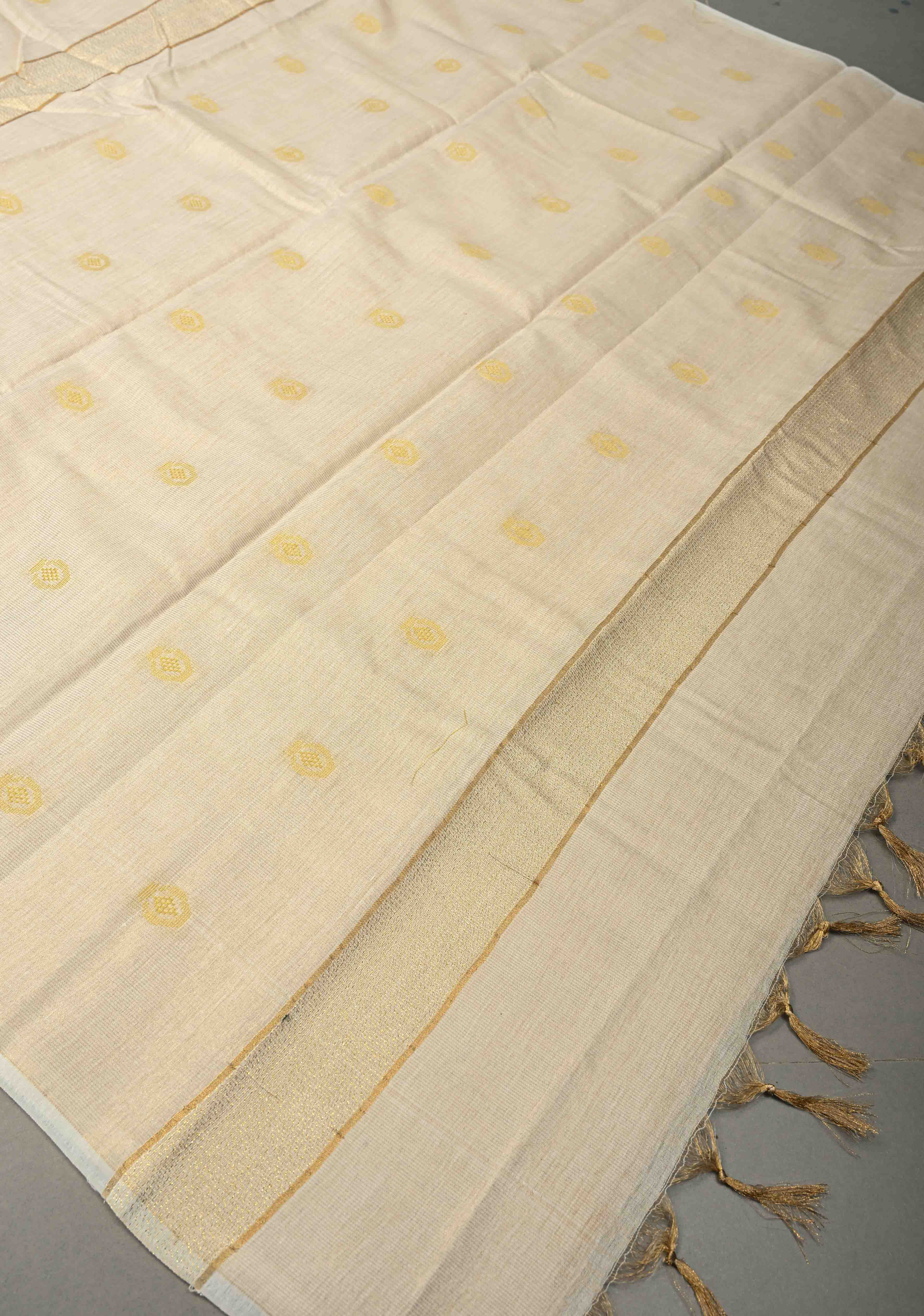 Ivory Borderless Semi Tussar Tissue Saree with Thread Buttas | Shobitam