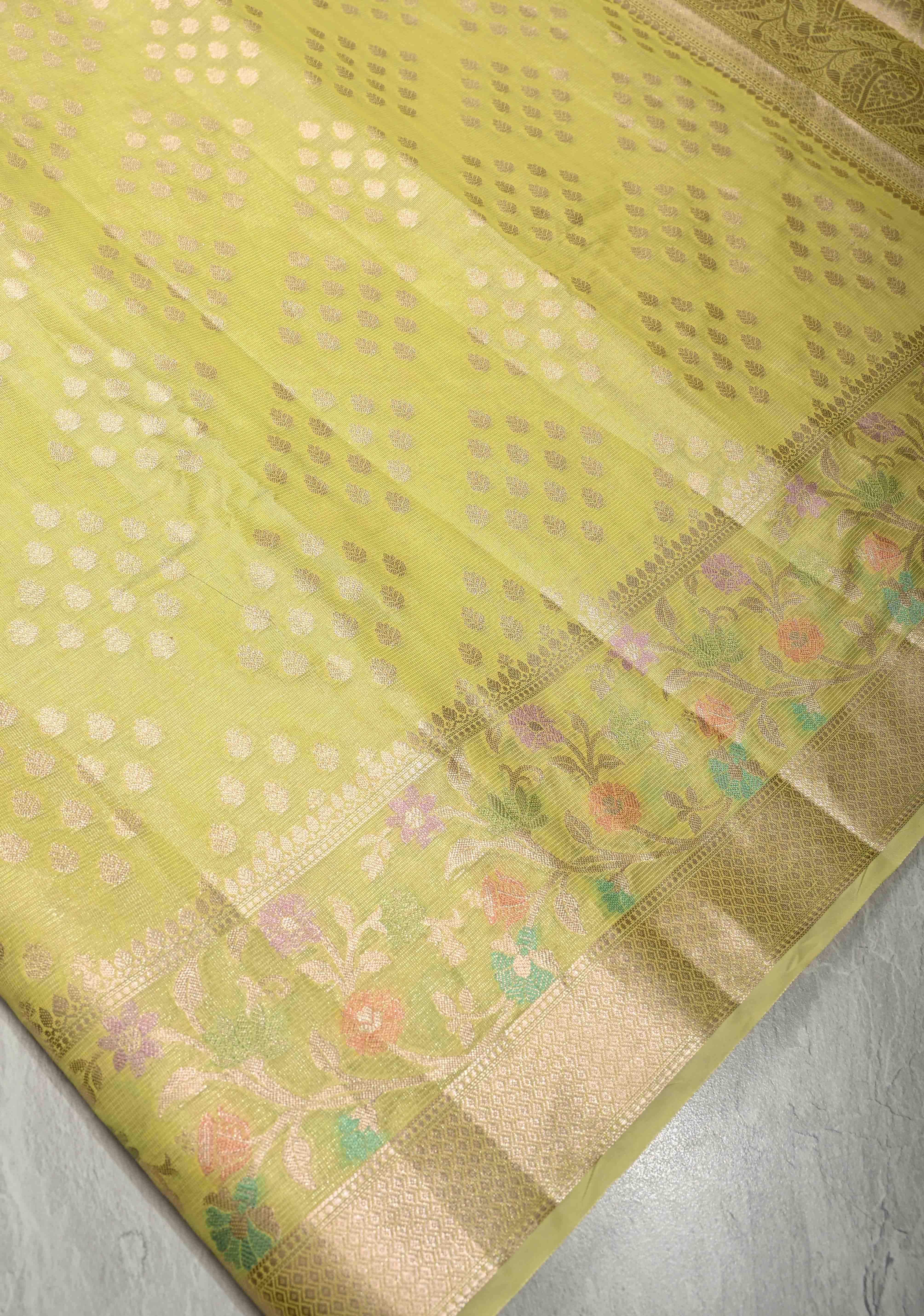 Lime Green Tissue Kanjivaram Semi Silk Saree with Leaf Buttas and Pastel meenakari Vine border | Shobitam