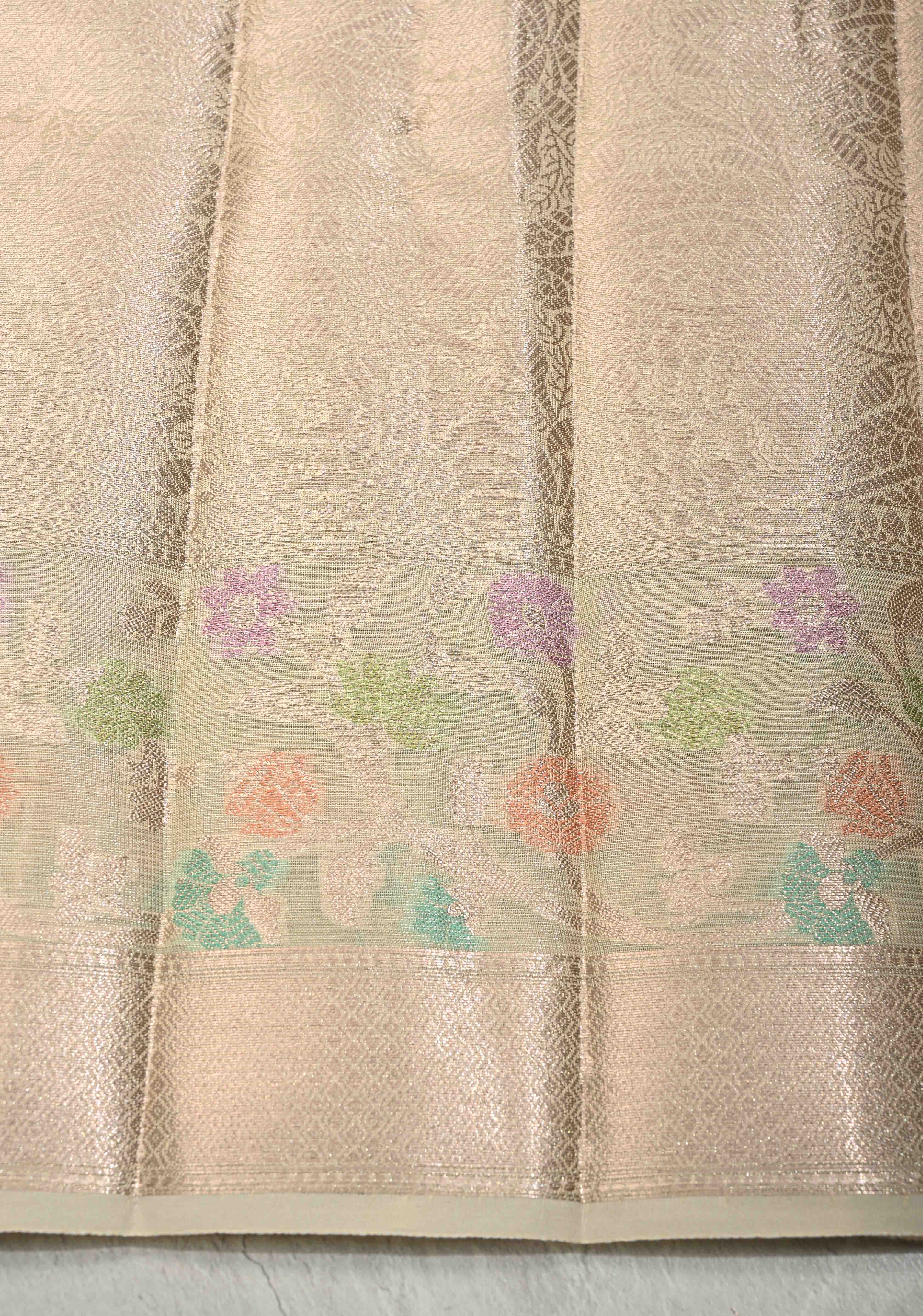 Ivory Tissue Kanjivaram Semi Silk Saree with  Leaf Buttas and Pastel meenakari Vine border | Shobitam
