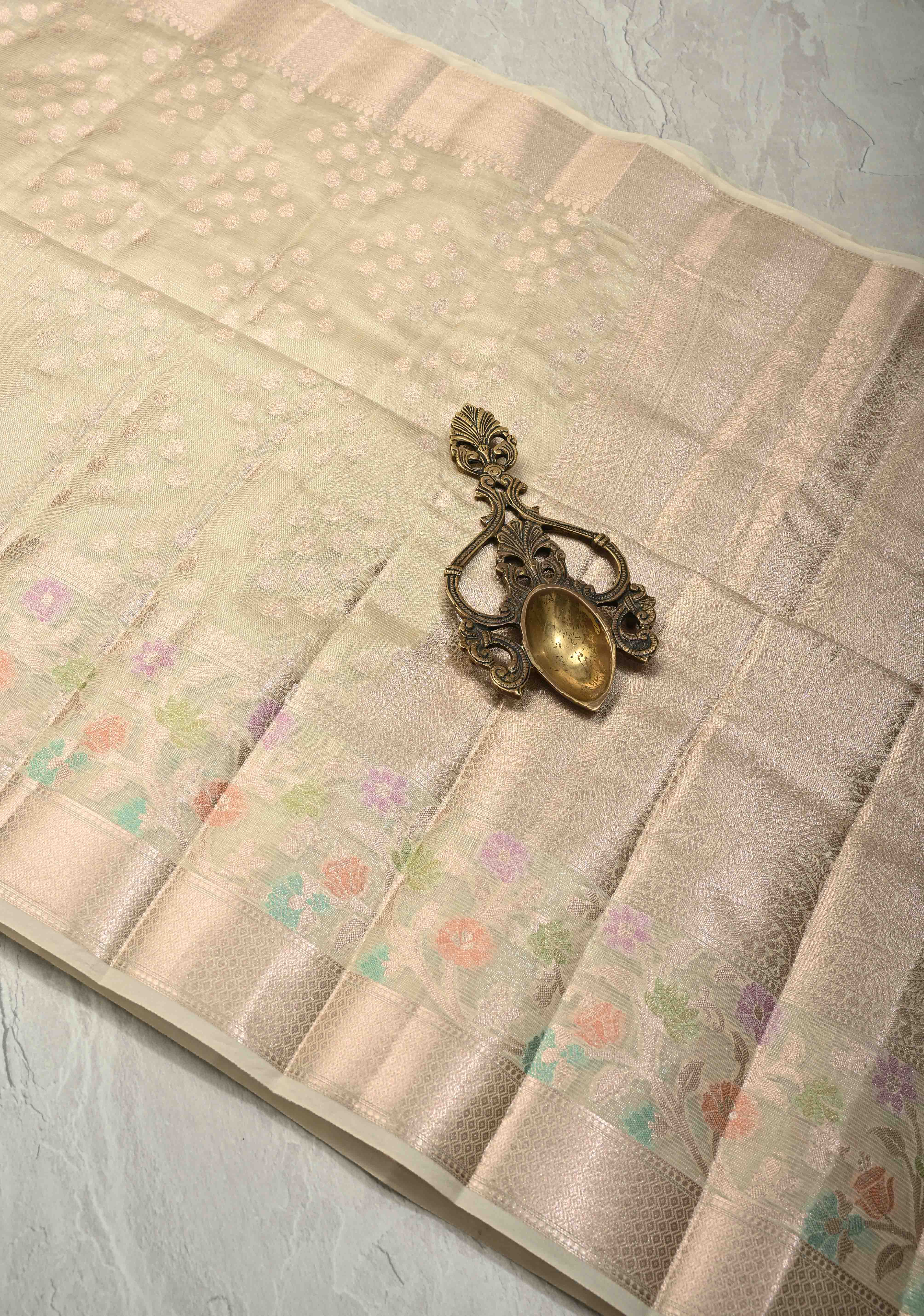 Ivory Tissue Kanjivaram Semi Silk Saree with  Leaf Buttas and Pastel meenakari Vine border | Shobitam