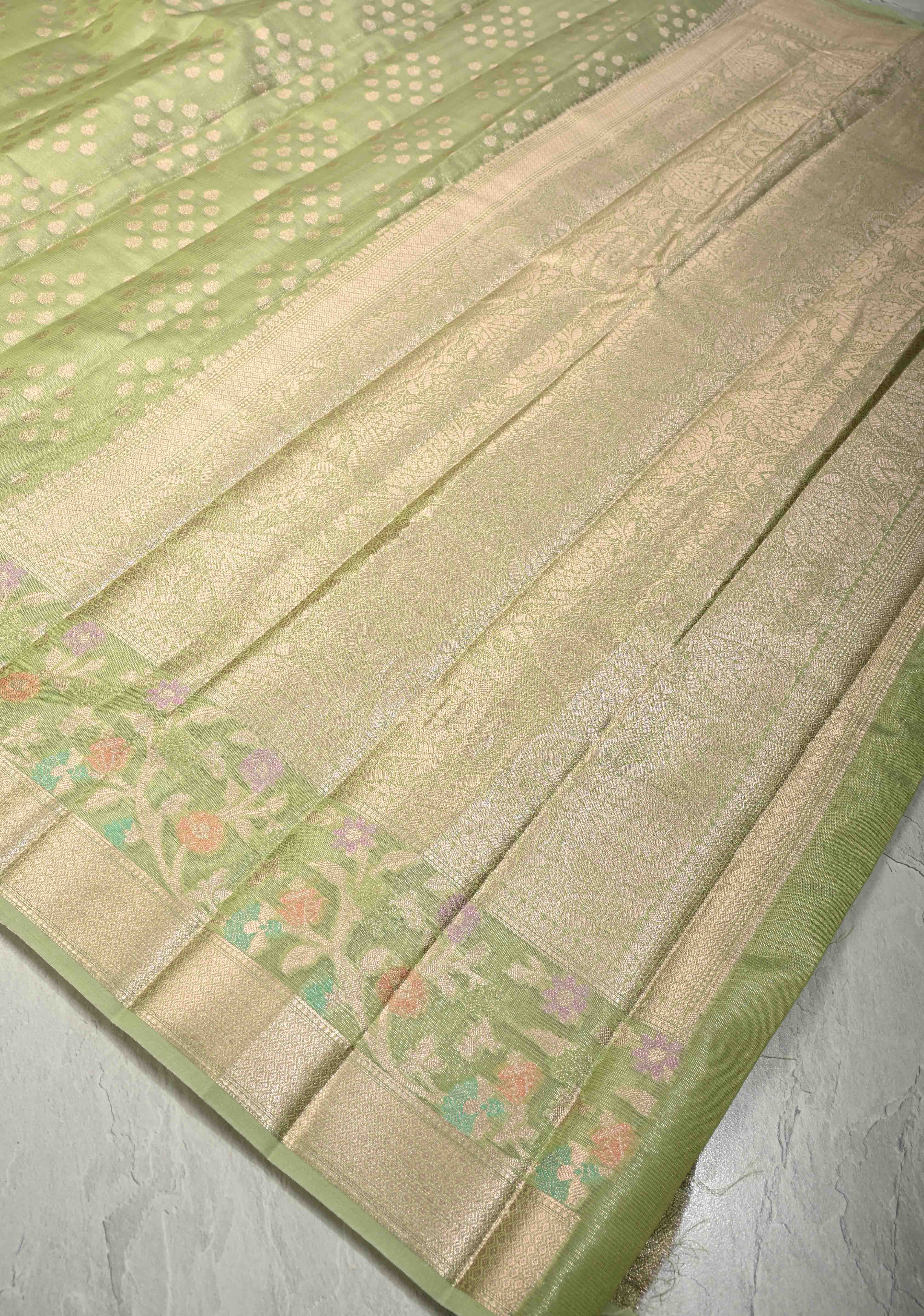 Light olive Green Tissue Kanjivaram Semi Silk Saree with Leaf Buttas and Pastel meenakari Vine border | Shobitam