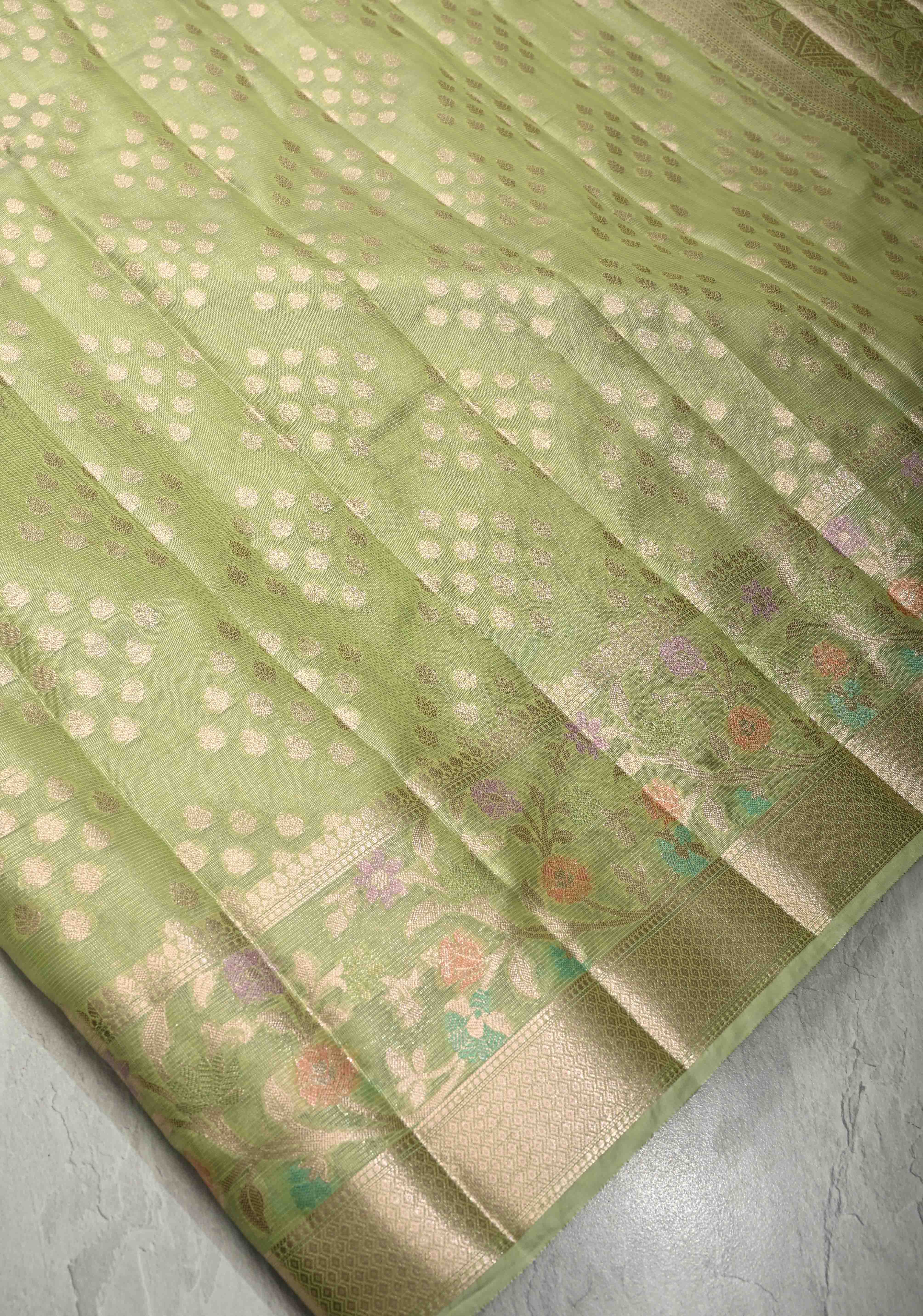 Light olive Green Tissue Kanjivaram Semi Silk Saree with Leaf Buttas and Pastel meenakari Vine border | Shobitam