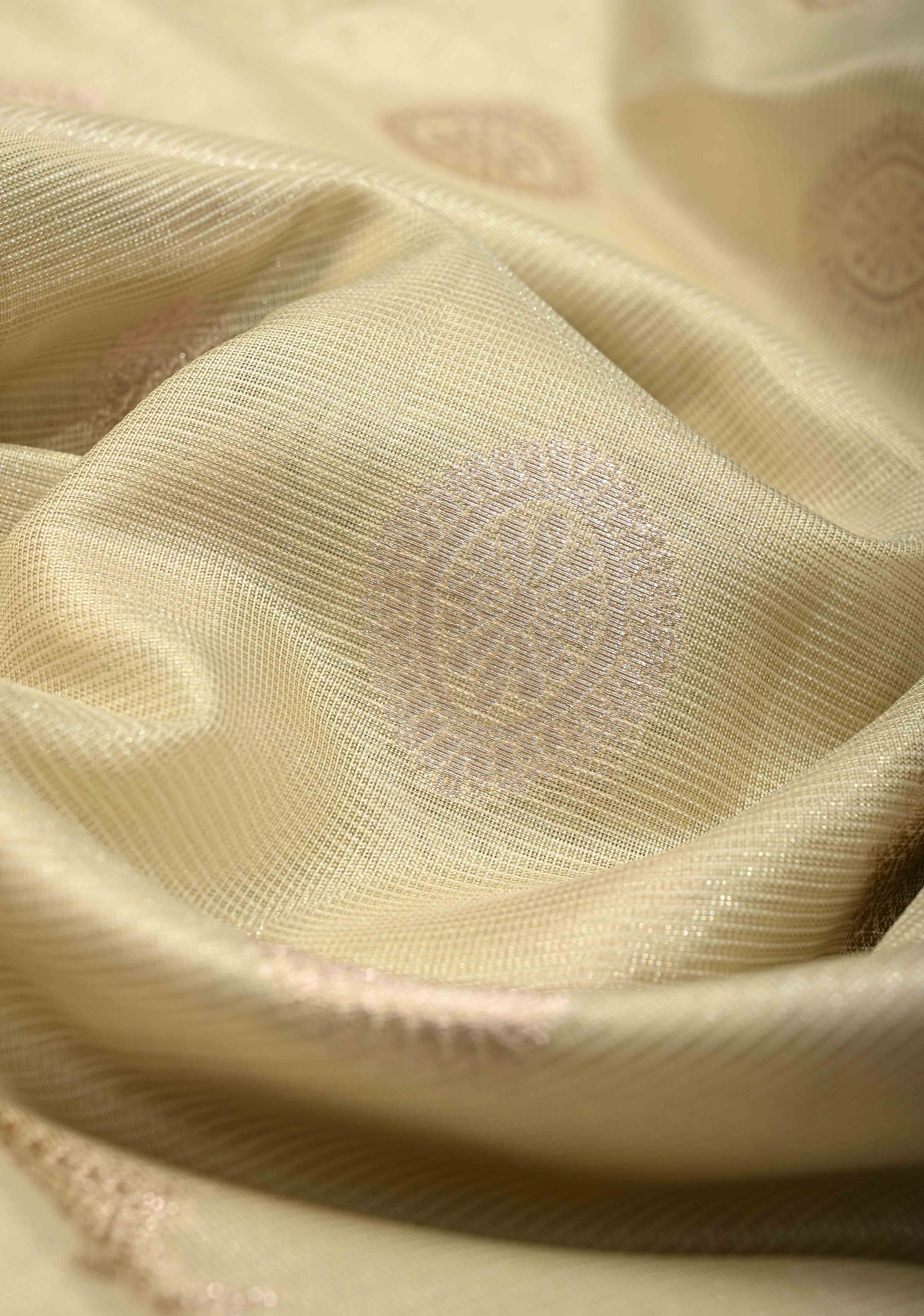 Creamy Green Kanjivaram Tissue Semi Silk Saree with Zari Buttas and Contrast Zari Border | Shobitam