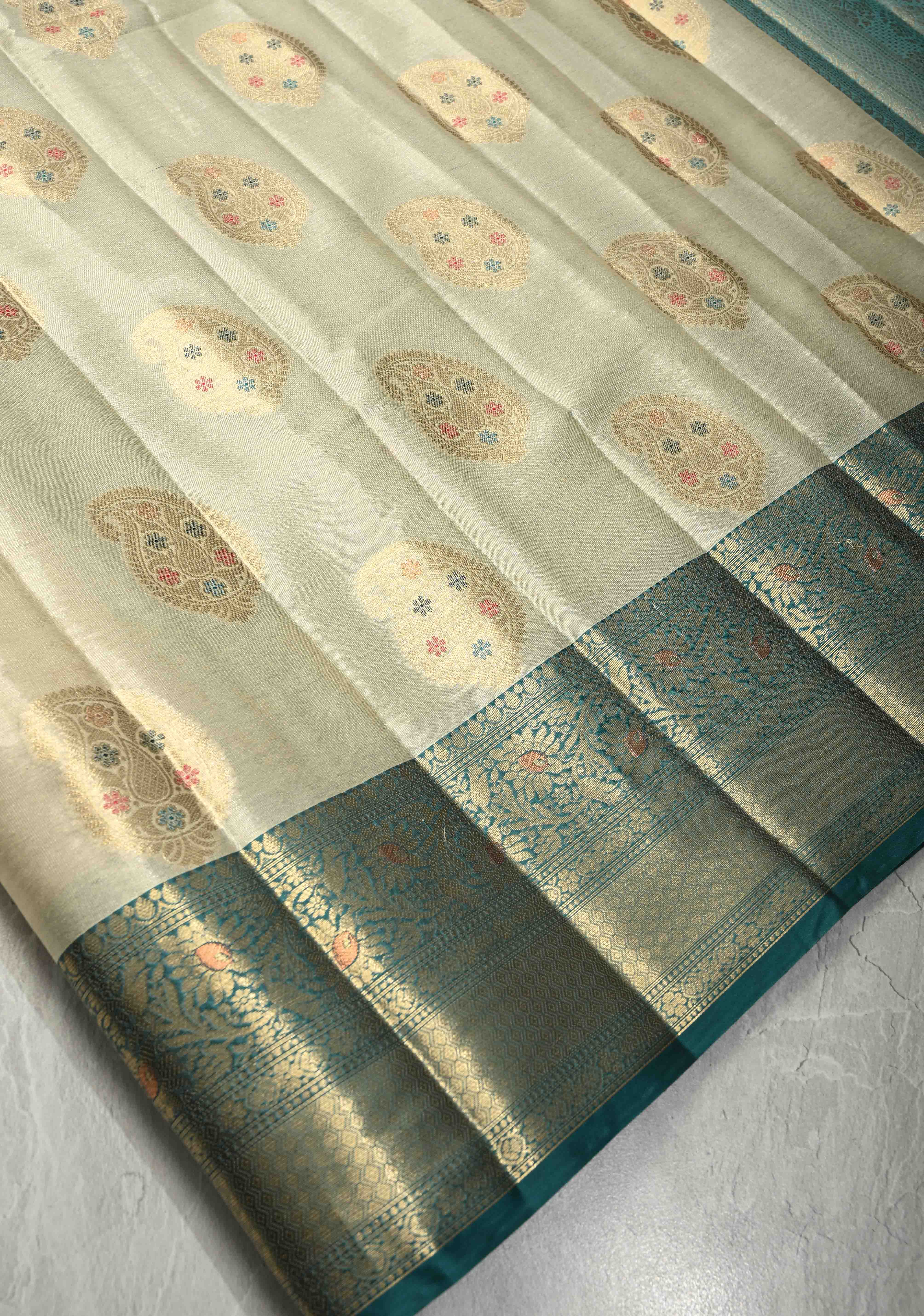Beige Kanjivaram Tissue Semi Silk Saree with Meenakari Paisley Zari Buttas and Contrast Zari Border | Shobitam