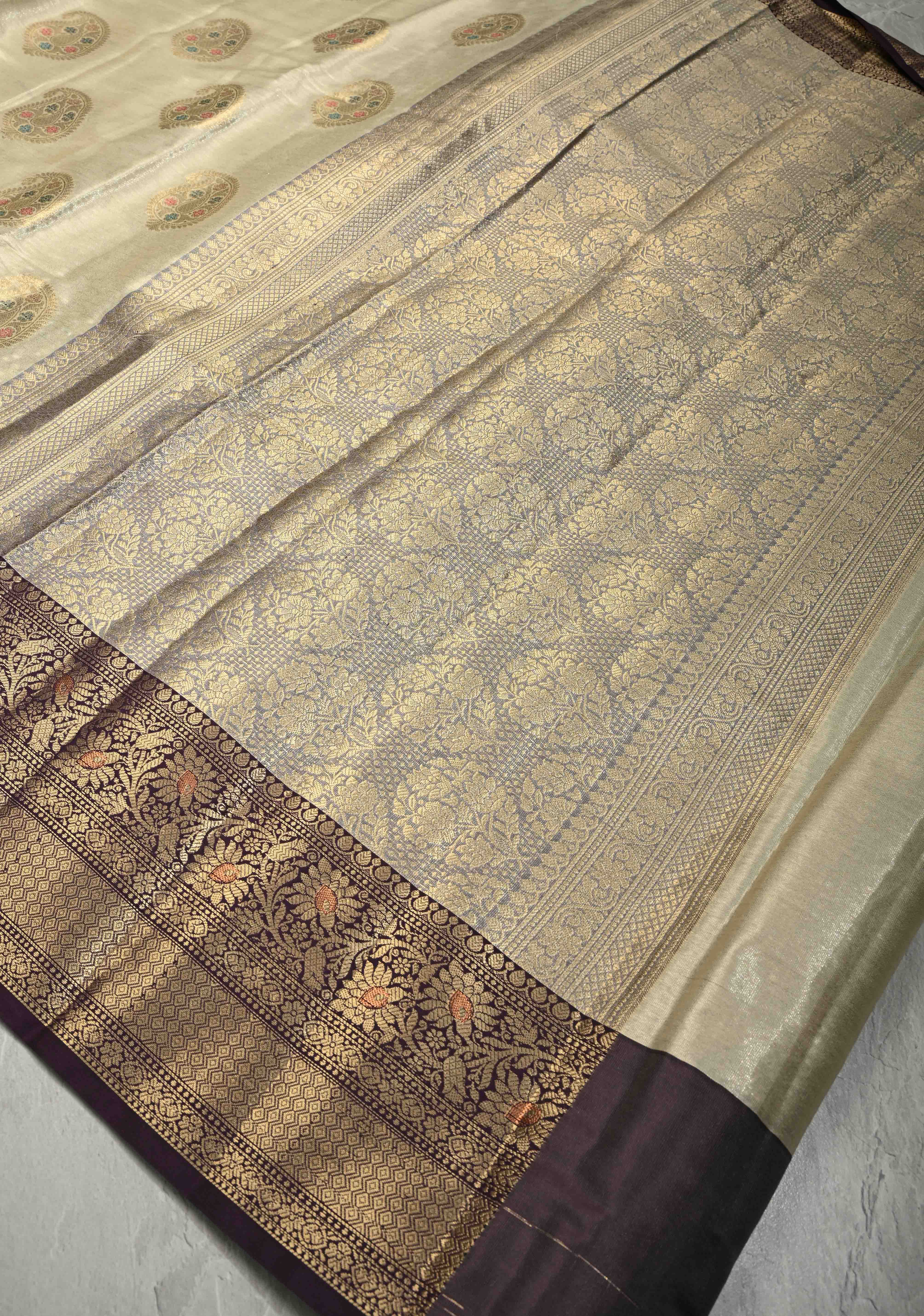 Cream Kanjivaram Tissue Semi Silk Saree with Meenakari Paisley Zari Buttas and Contrast Zari Border | Shobitam