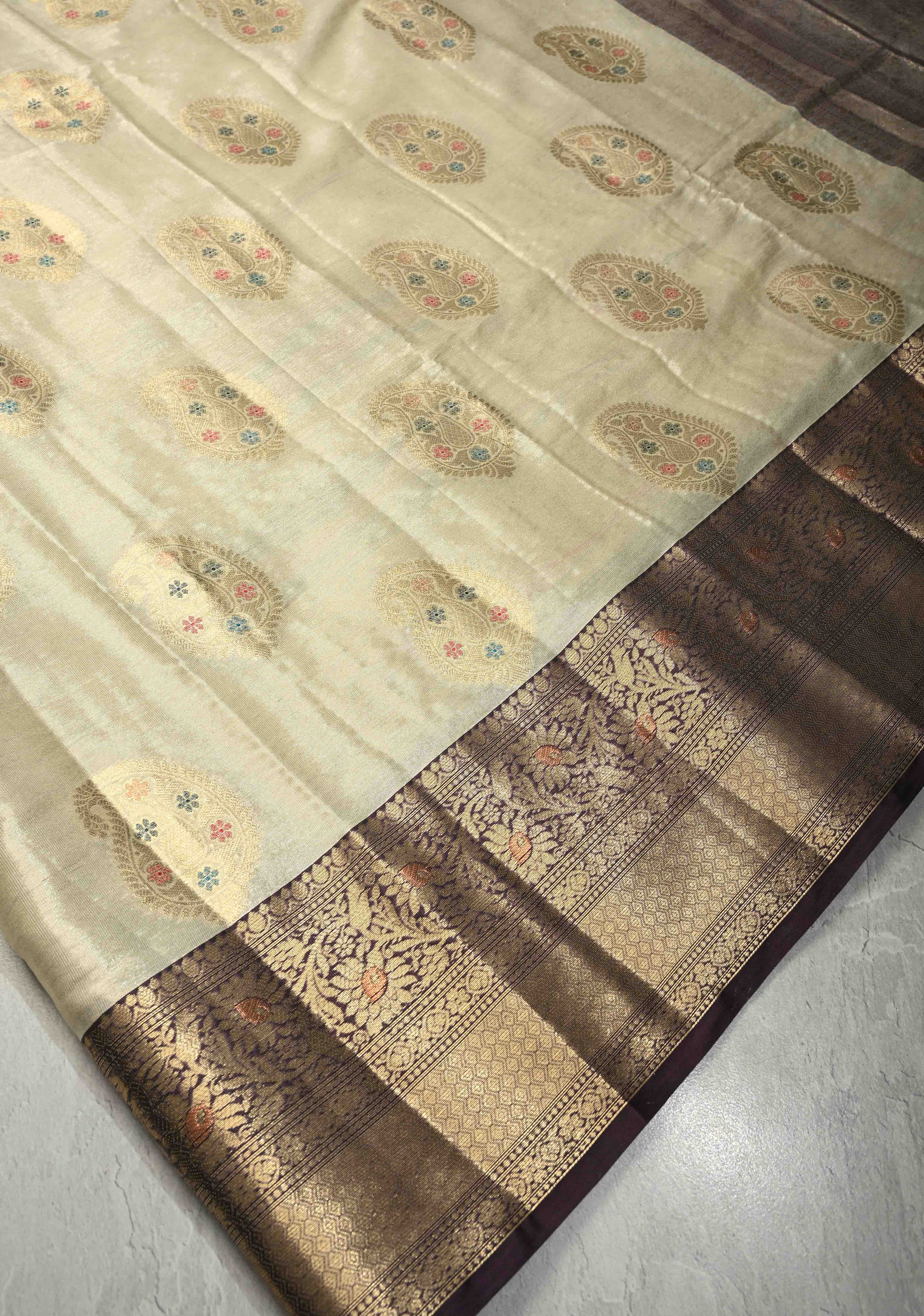 Cream Kanjivaram Tissue Semi Silk Saree with Meenakari Paisley Zari Buttas and Contrast Zari Border | Shobitam