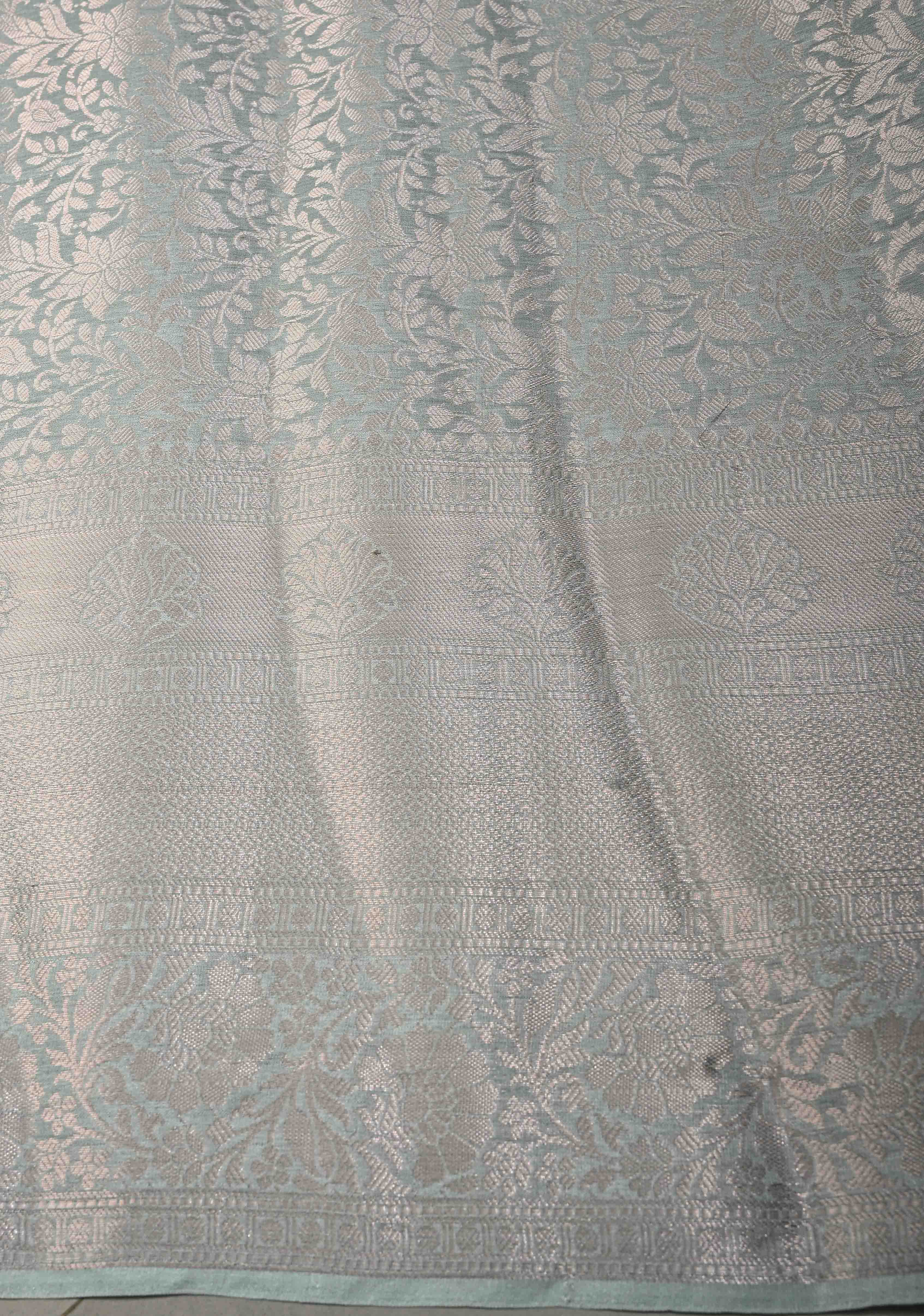 Pastel Sage Green Floral Digital Print on Banarasi Semi Silk Saree with Muted Zari Chevron Design and Wide Zari Border | Shobitam