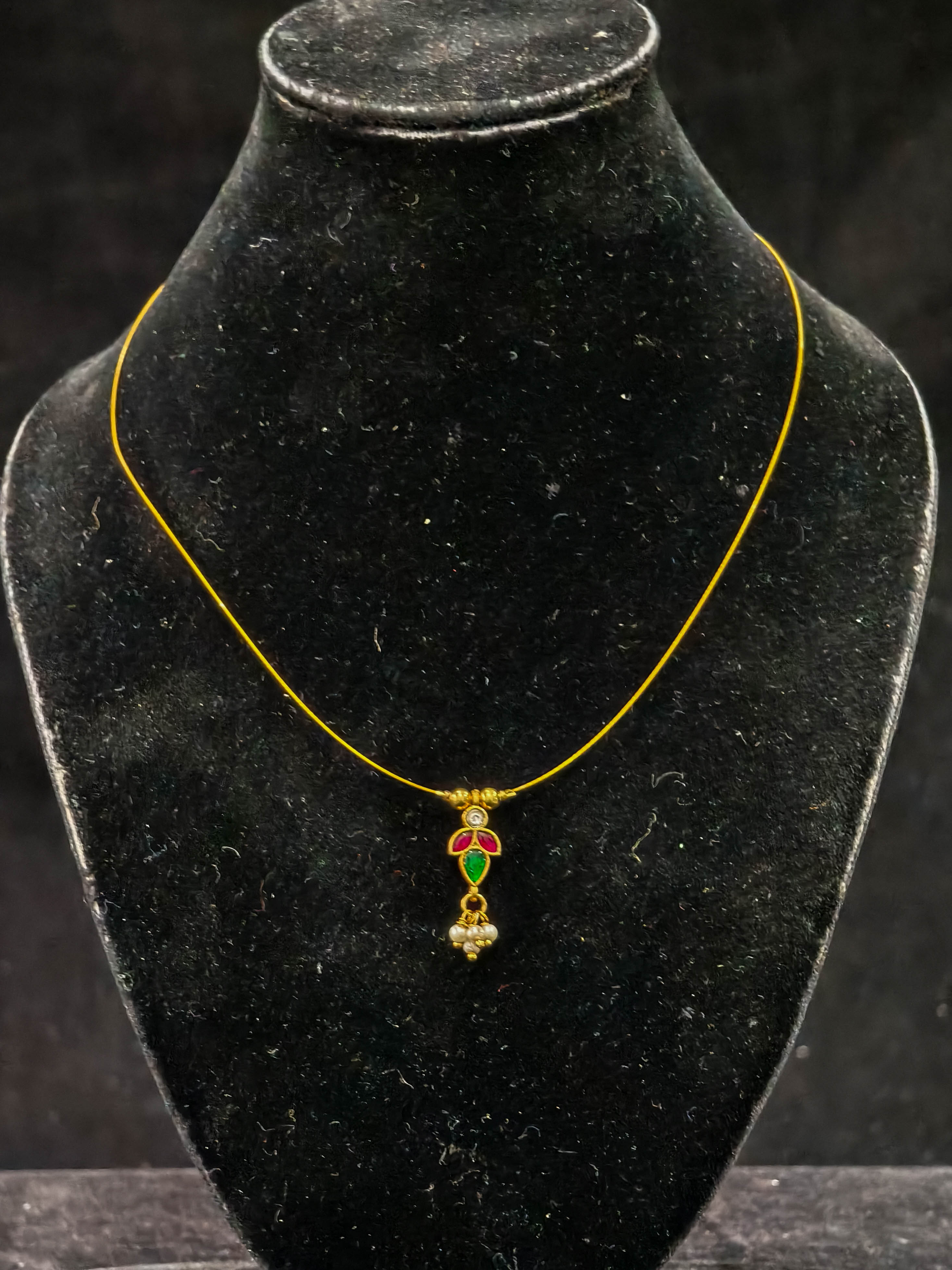 Invisible wire design with Floral Pendant and Jadau Green,Pink Stone | SHOBITAM