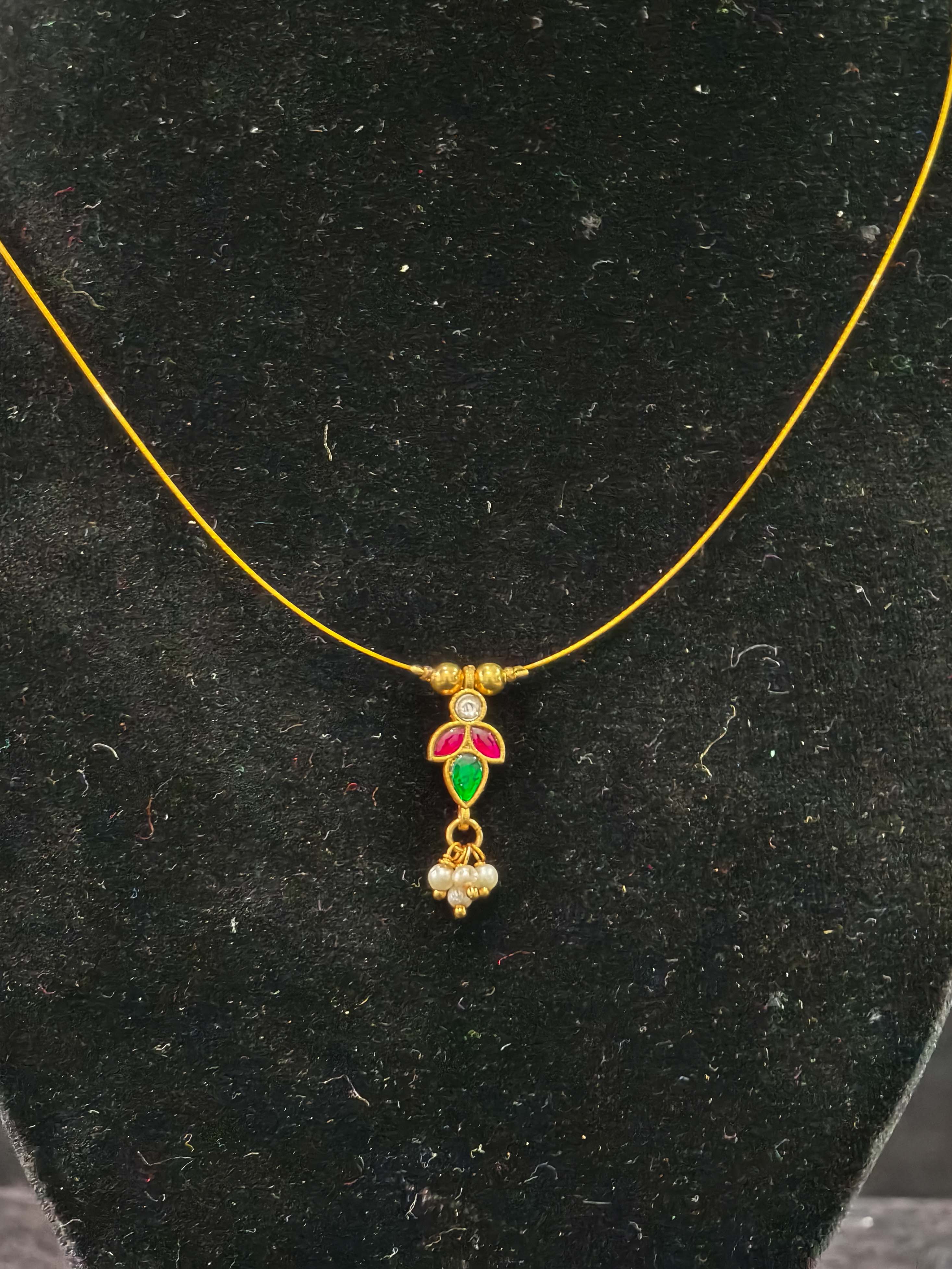 Invisible wire design with Floral Pendant and Jadau Green,Pink Stone | SHOBITAM