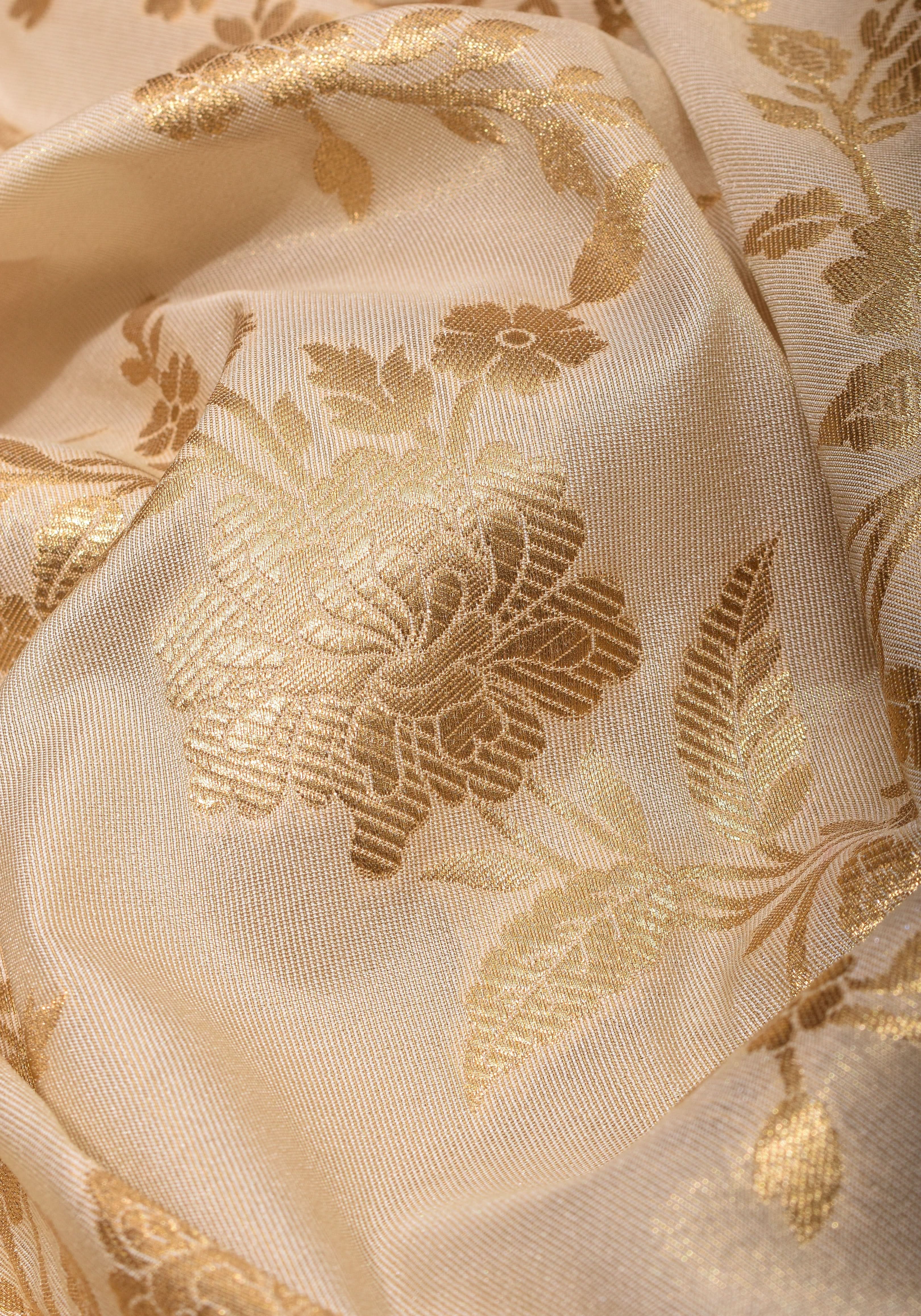 Ivory Tissue Semi silk saree with leheria Zari Floral vine Pattern and Meenakari Zari Pallu | SHOBITAM