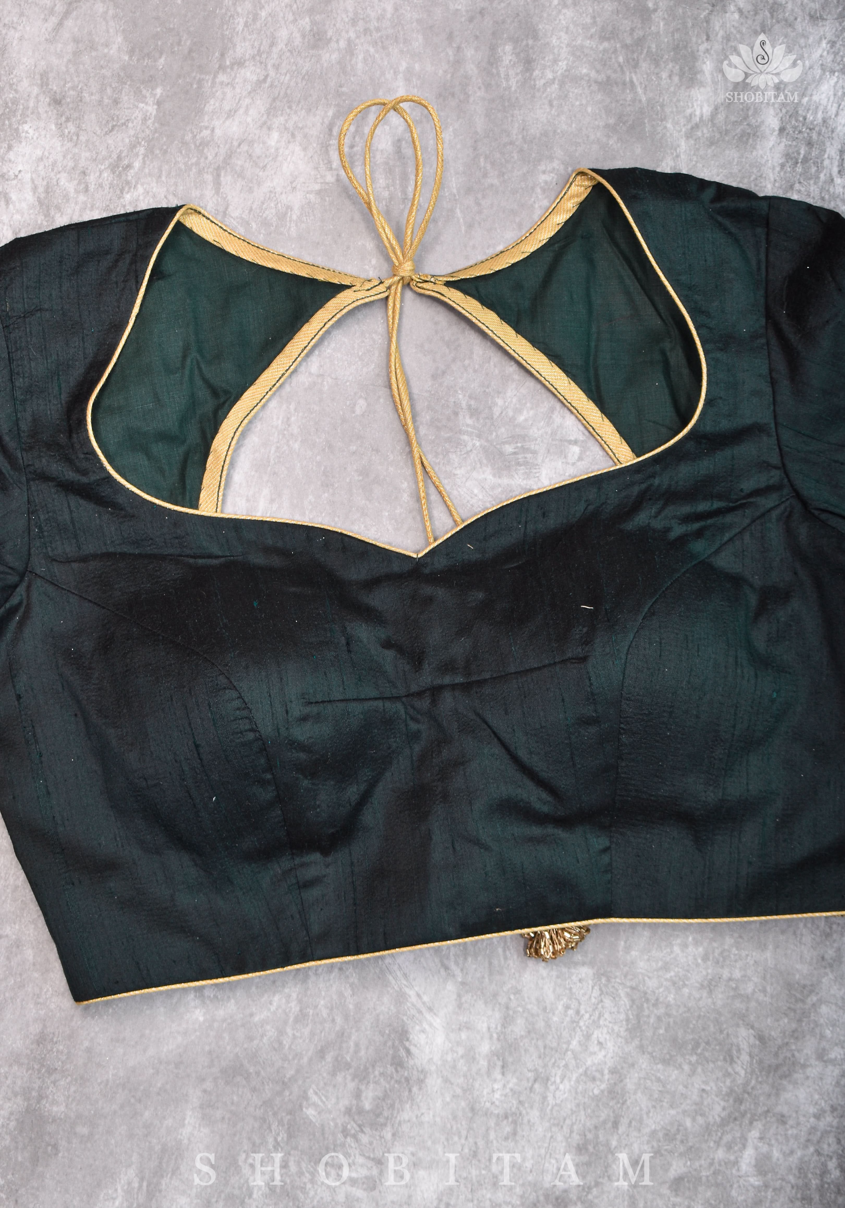 Green Pure Raw Silk Blouse with Leaf Neck, Zari detailing and Cutdana Tassels | Shobitam