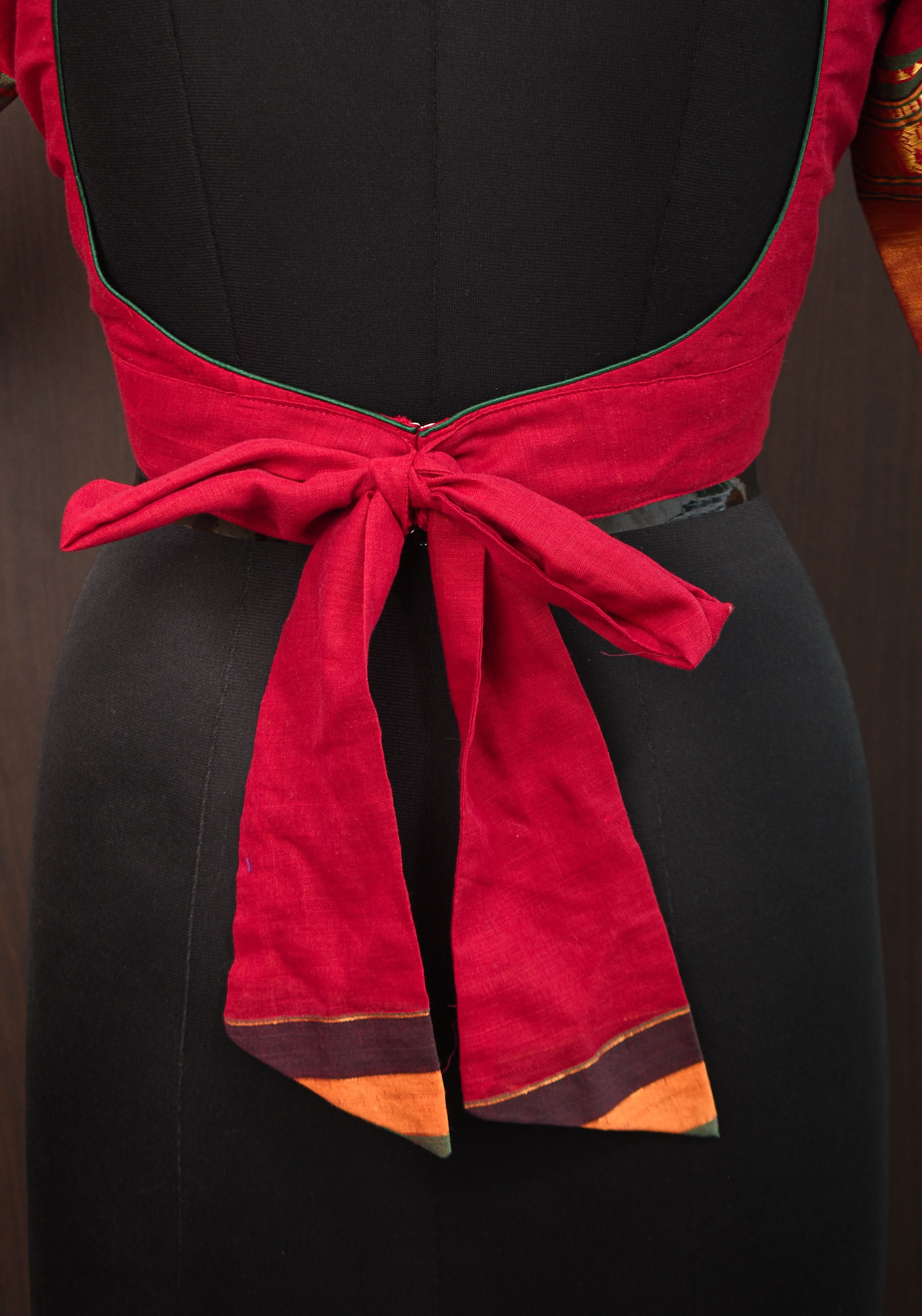 Maroon Narayanpet cotton boatneck blouse with oval cutout and tieback design | Shobitam