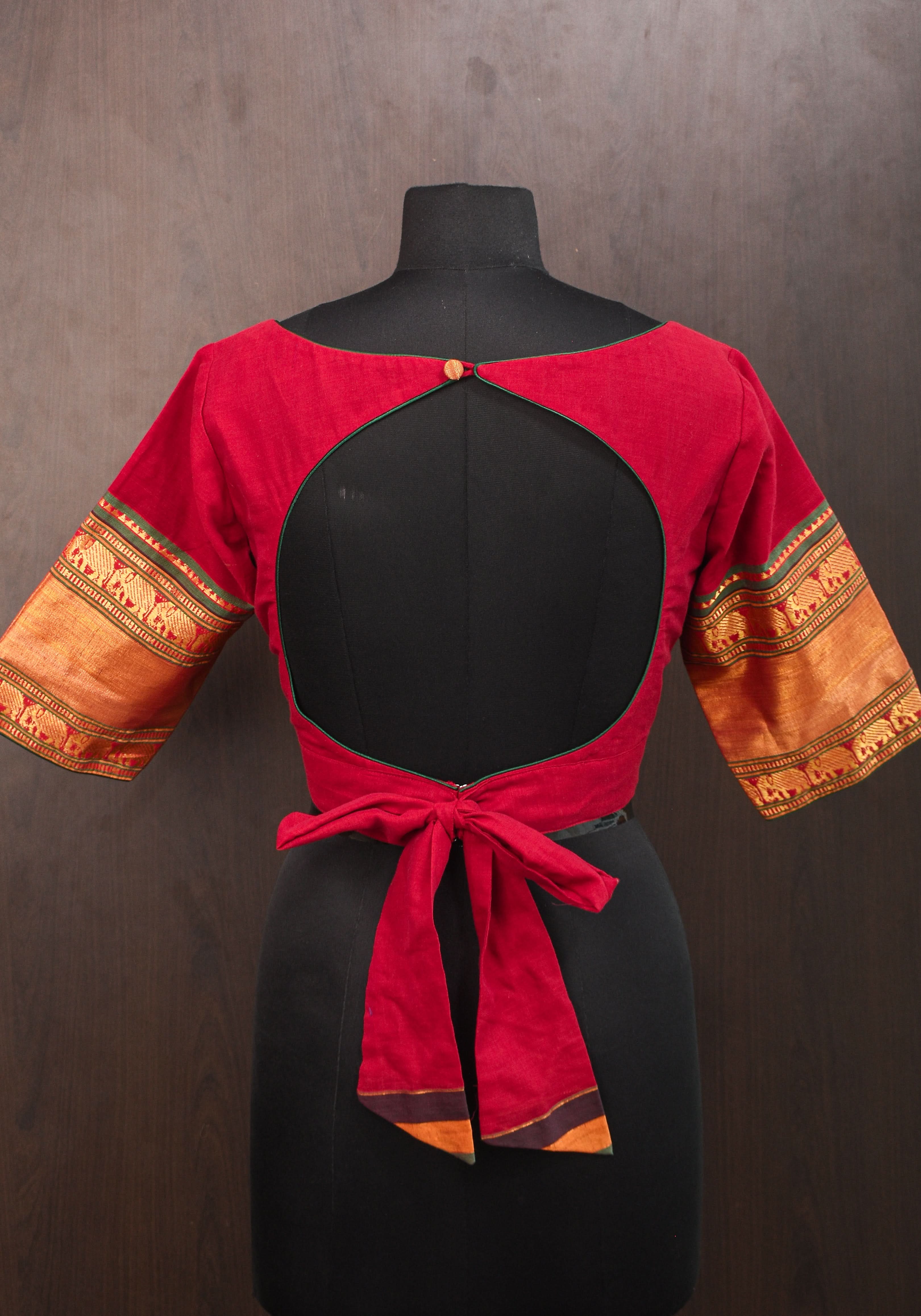Maroon Narayanpet cotton boatneck blouse with oval cutout and tieback design | Shobitam