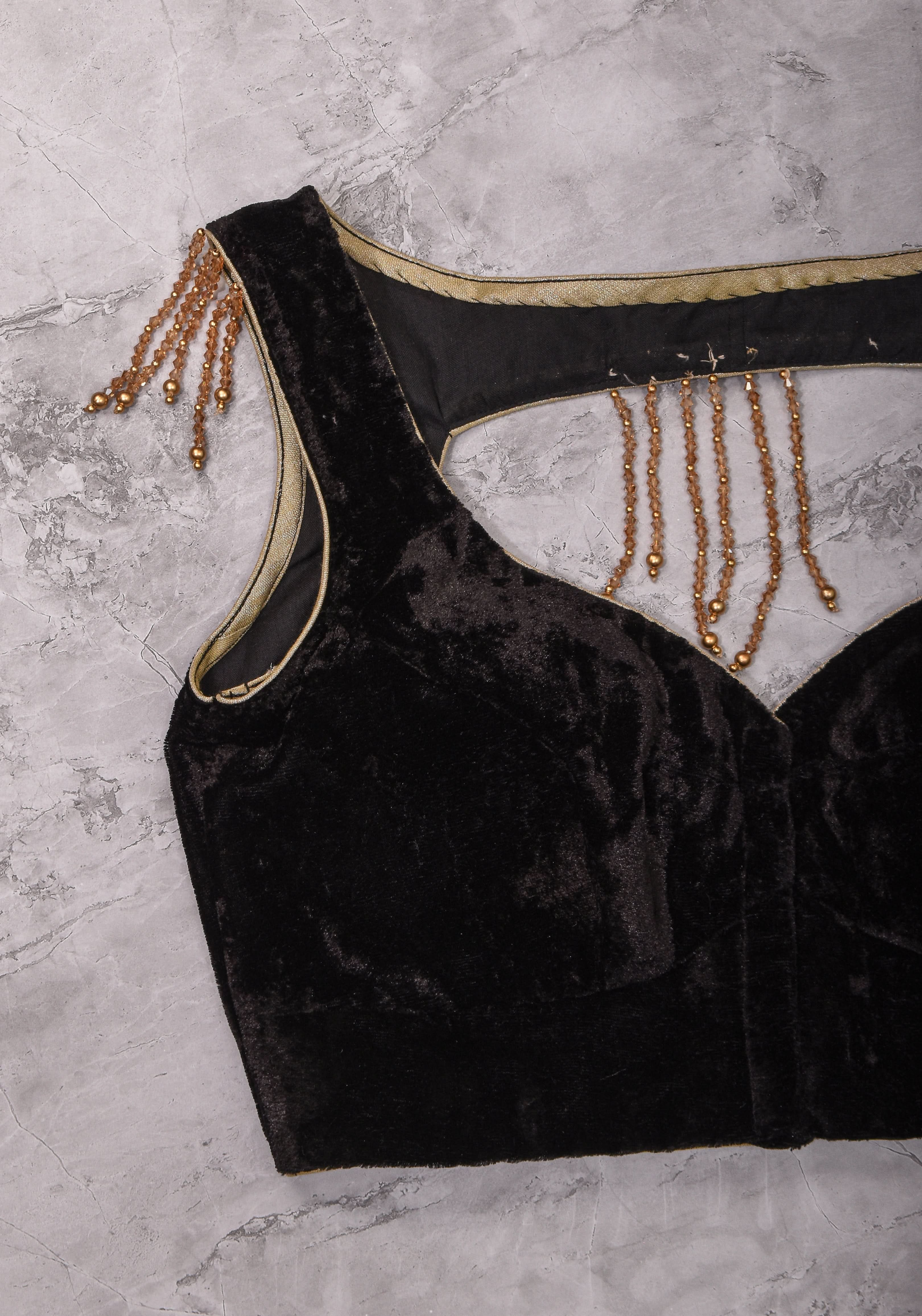 Velvet leaf neck Blouse with crystal beads detailing in black | Shobitam