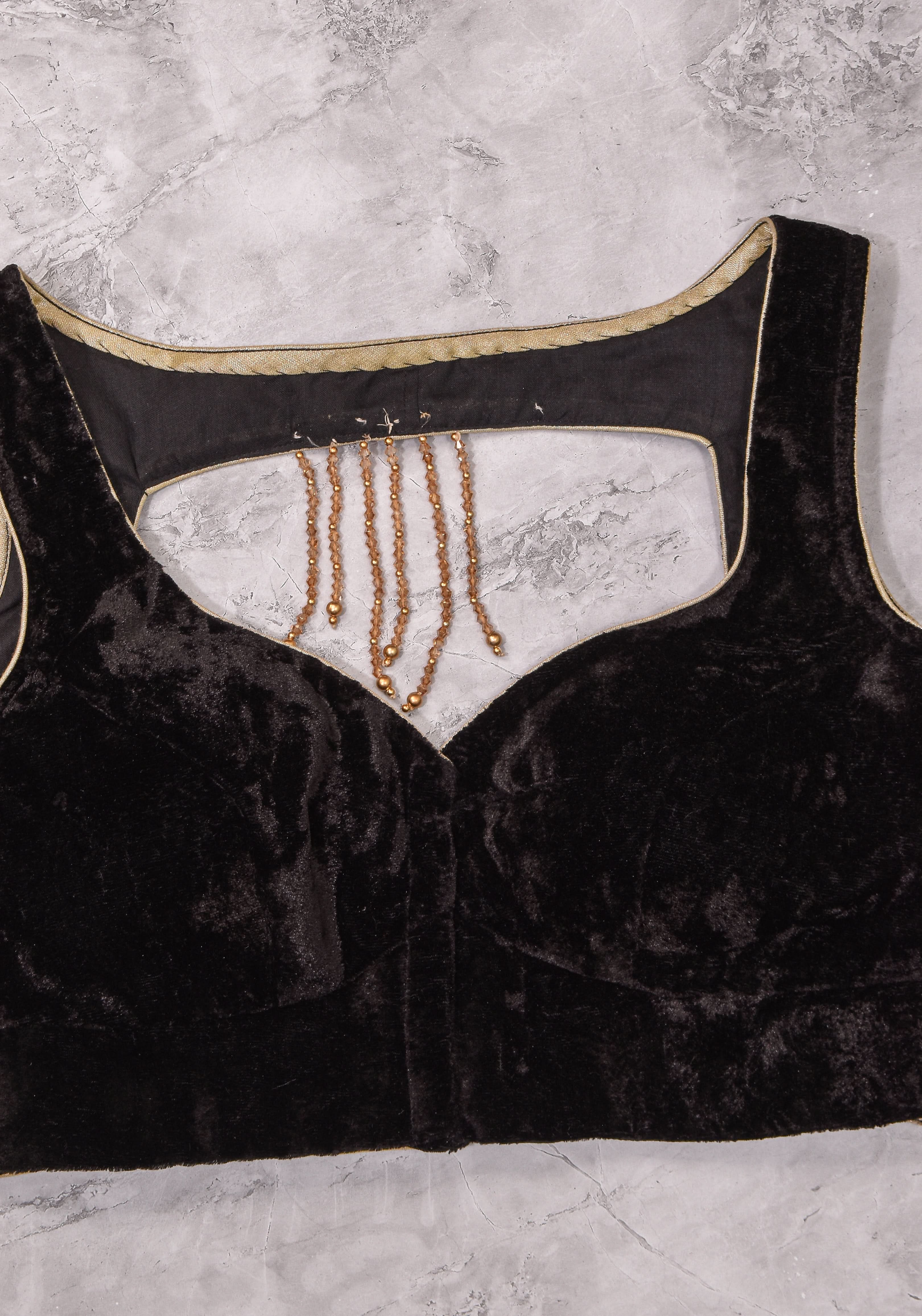 Velvet leaf neck Blouse with crystal beads detailing in black | Shobitam