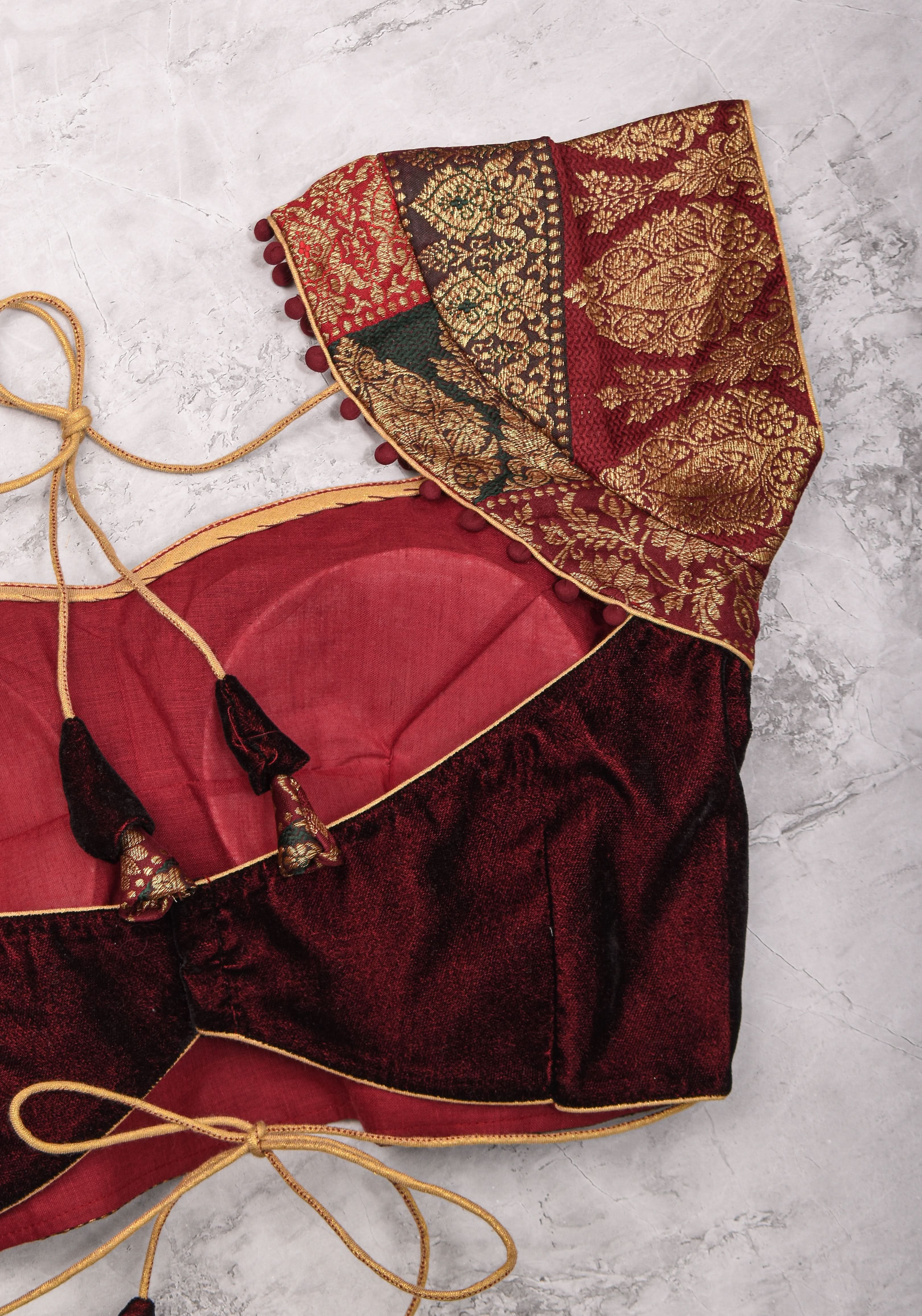 Burgundy Velvet and Banarasi brocade Sweetheart neck blouse, with potli button detailing on neckline, Made to Order | Shobitam