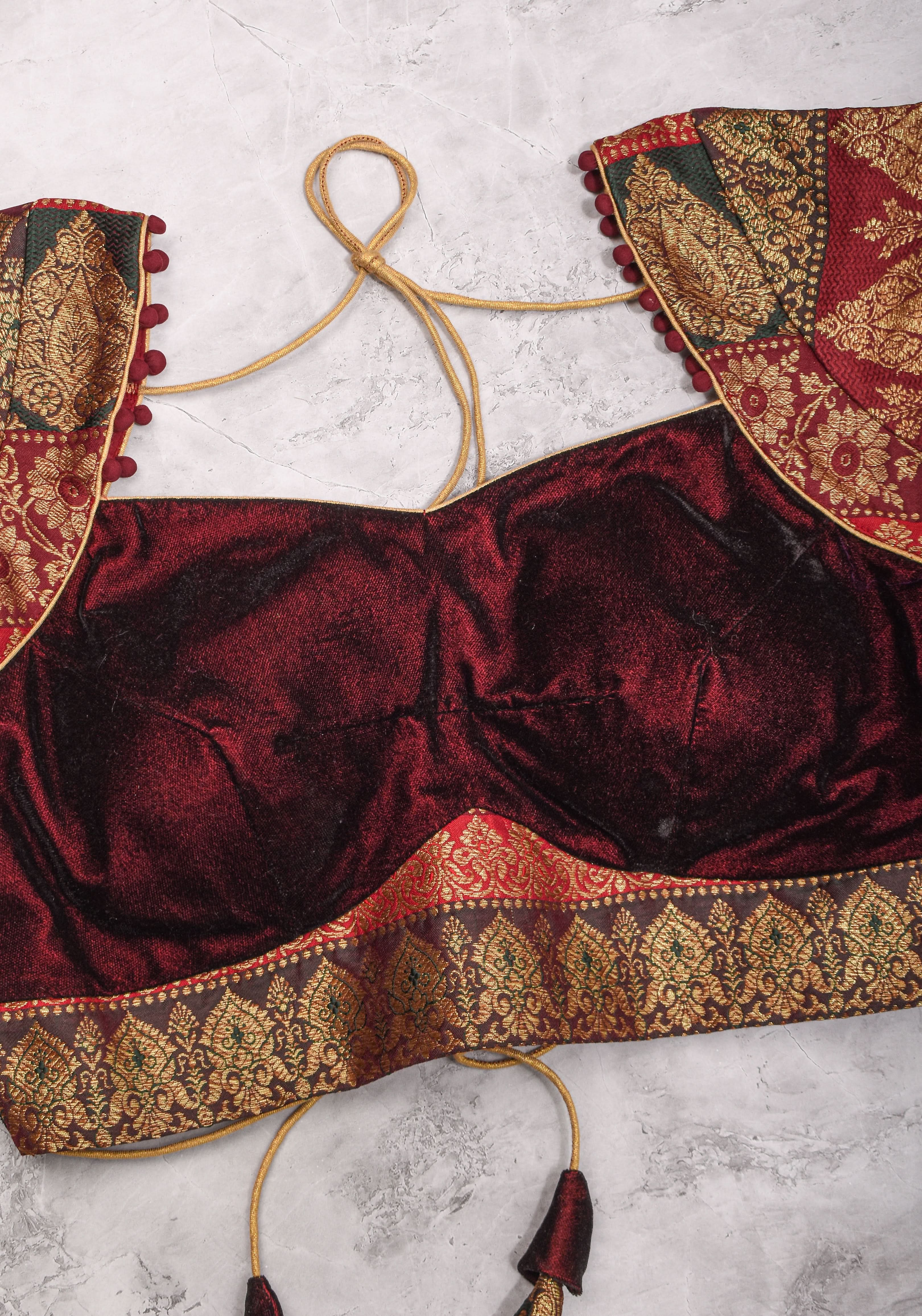 Burgundy Velvet and Banarasi brocade Sweetheart neck blouse, with potli button detailing on neckline, Made to Order | Shobitam