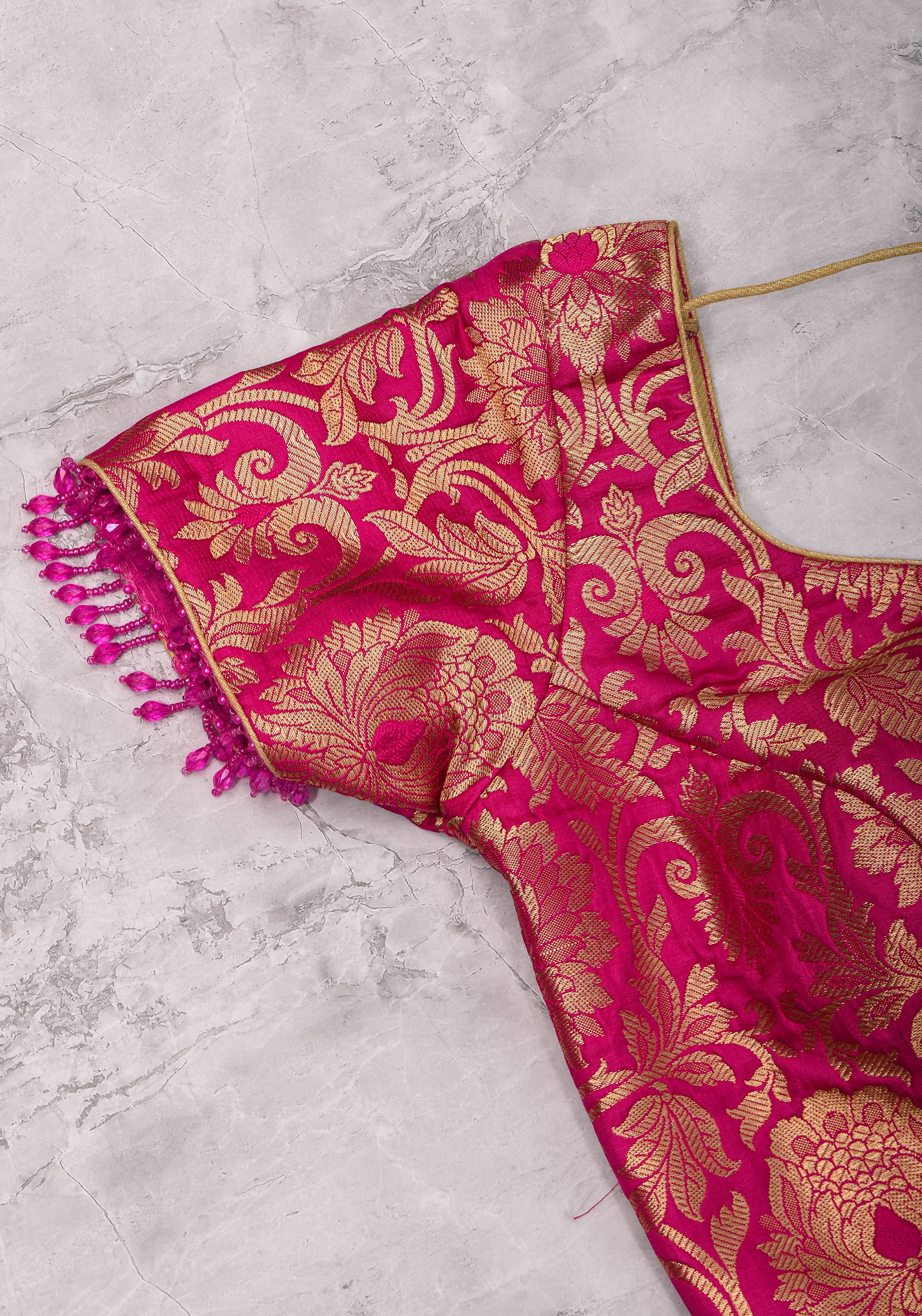 Rani Pink Banarasi Brocade Blouse with Back tie design and dangling beads | Shobitam